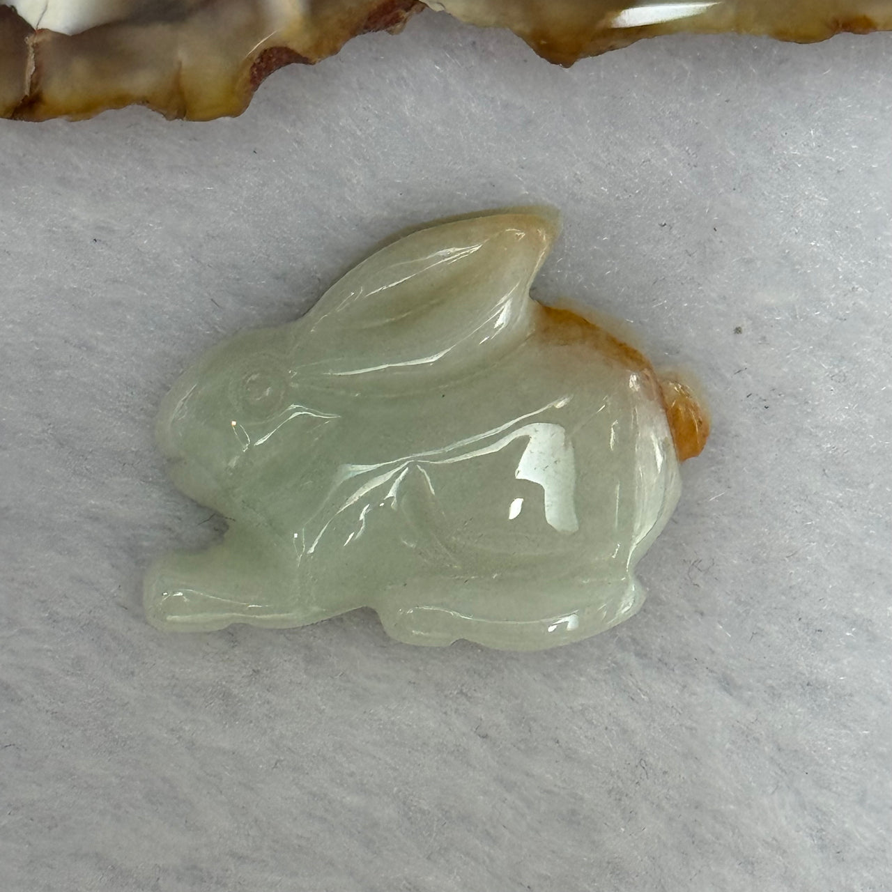 Type A Light Green with Brown Patch Jadeite Rabbit Pendant 5.92g 22.2 by 8.3 by 17.9mm - Huangs Jadeite and Jewelry Pte Ltd