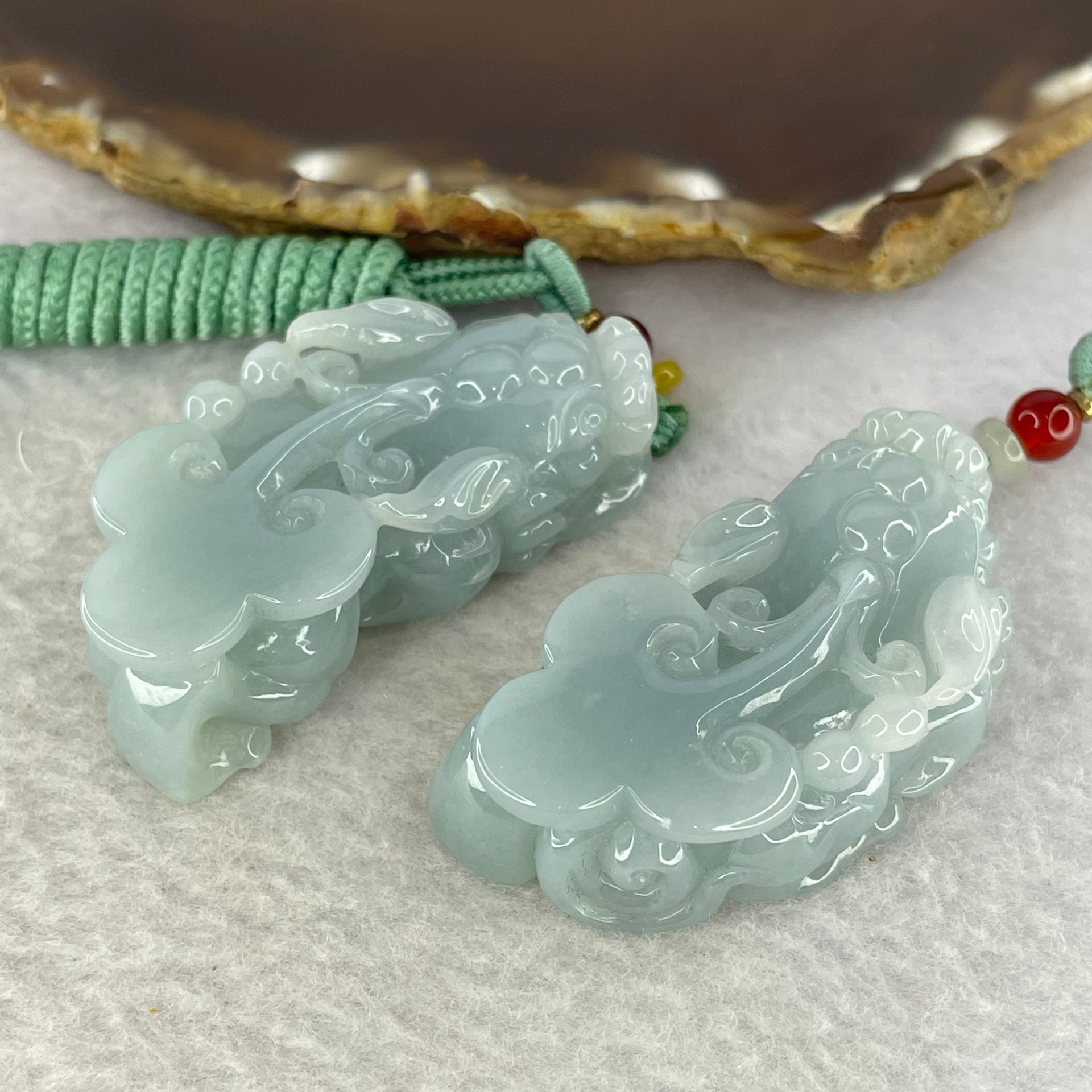 Type A Sky Blue Jadeite Pixiu Pair  40.26g 50.7 by 26.4 by 14.3 mm and 38.99g 49.7 by 25.3 by 14.2 mm - Huangs Jadeite and Jewelry Pte Ltd