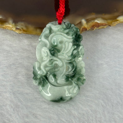 Type A Light Green with Blueish Green Piao Hua Jadeite Dragon Pendent 8.92g 32.9 by 22.0 by 6.1mm