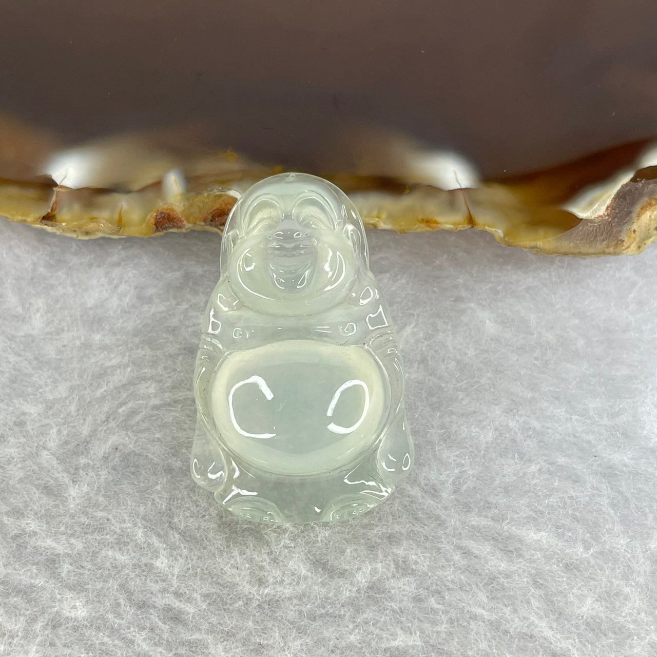 Type A Icy Faint Green Jadeite Milo Buddha 5.15g 29.8 by 19.1 by 6.7 mm - Huangs Jadeite and Jewelry Pte Ltd