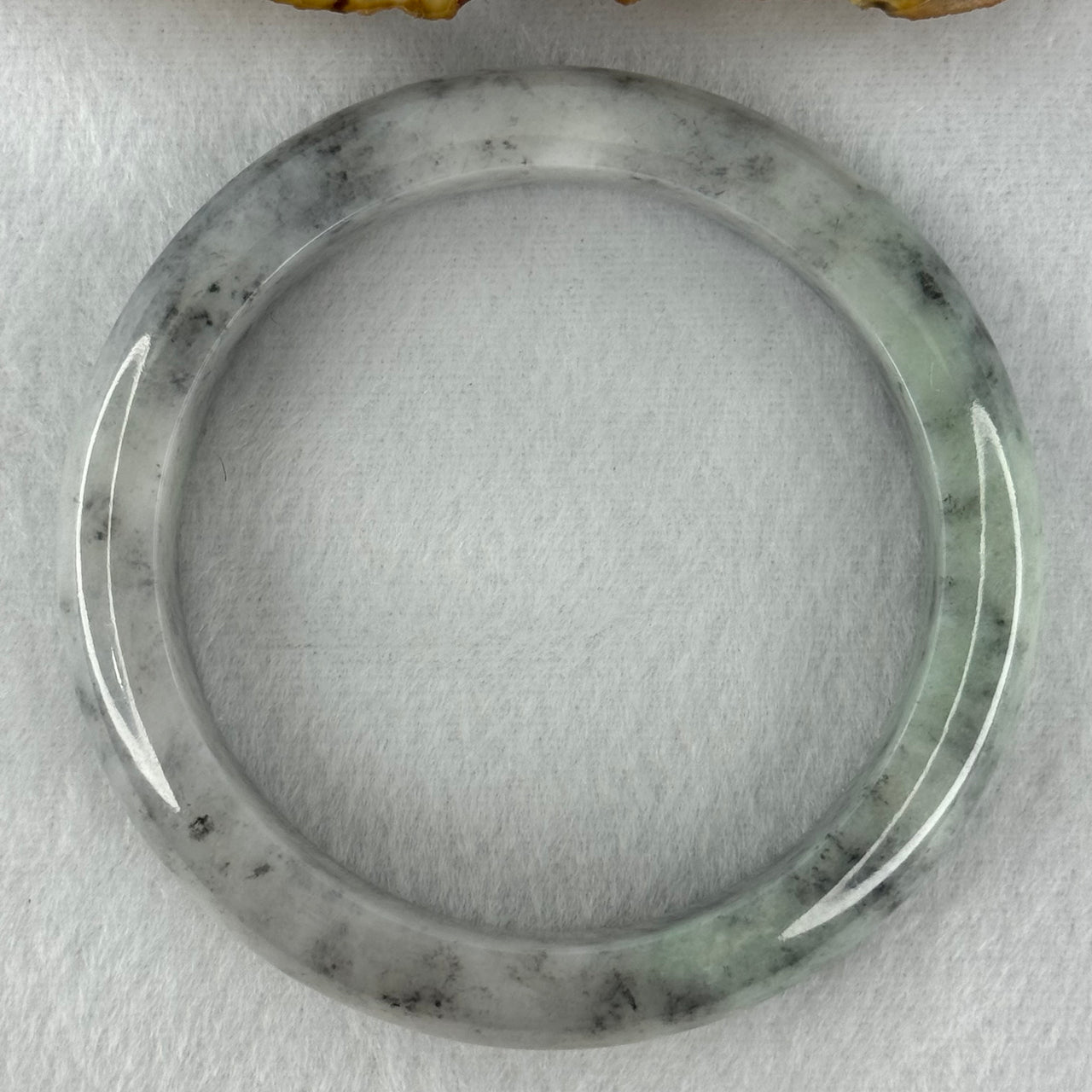 Type A Faint Green and Black Piao Hua Jadeite Bangle Internal Diameter 57.2mm 65.08g 13.4 by 8.7mm (Very Slight Internal Lines)