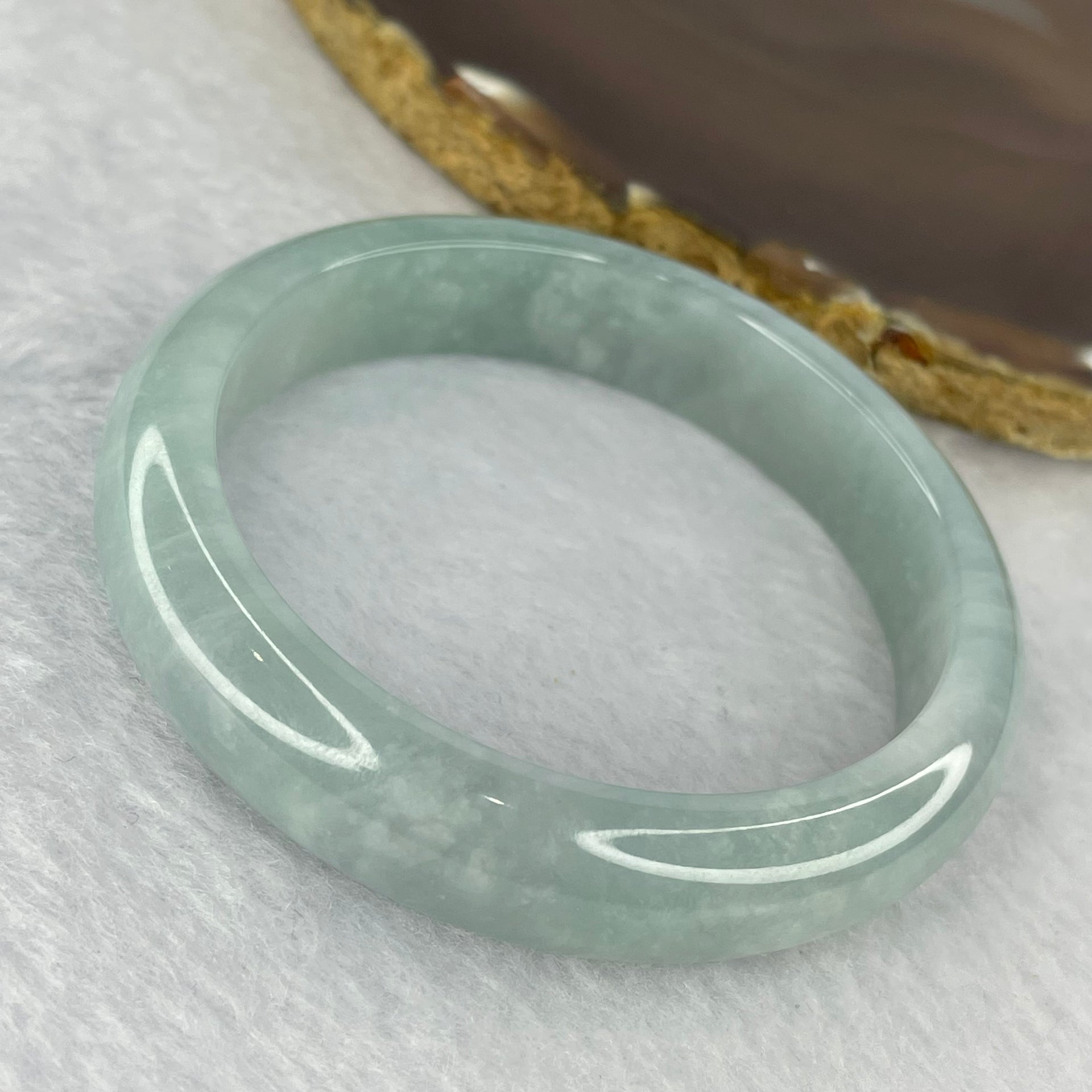 Type A Highly Translucent Jelly Sky Blue Jadeite Bangle 49.68g 12.9 by 7.4 mm Internal Diameter 55.1 mm (Close to Perfect) - Huangs Jadeite and Jewelry Pte Ltd