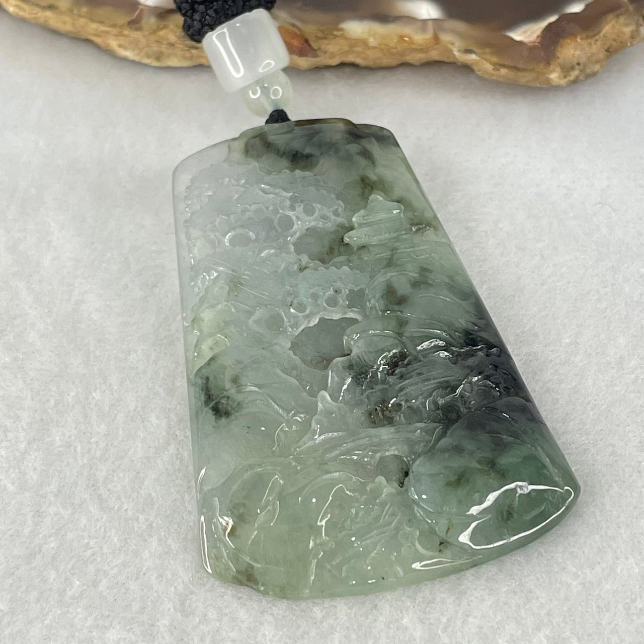 Type A Semi Icy Lavender with Dark Green Piao Hua Jadeite Shan Shui with Gui Ren Benefactor Pendant 23.74g 58.1 by 37.9 by 6.4mm