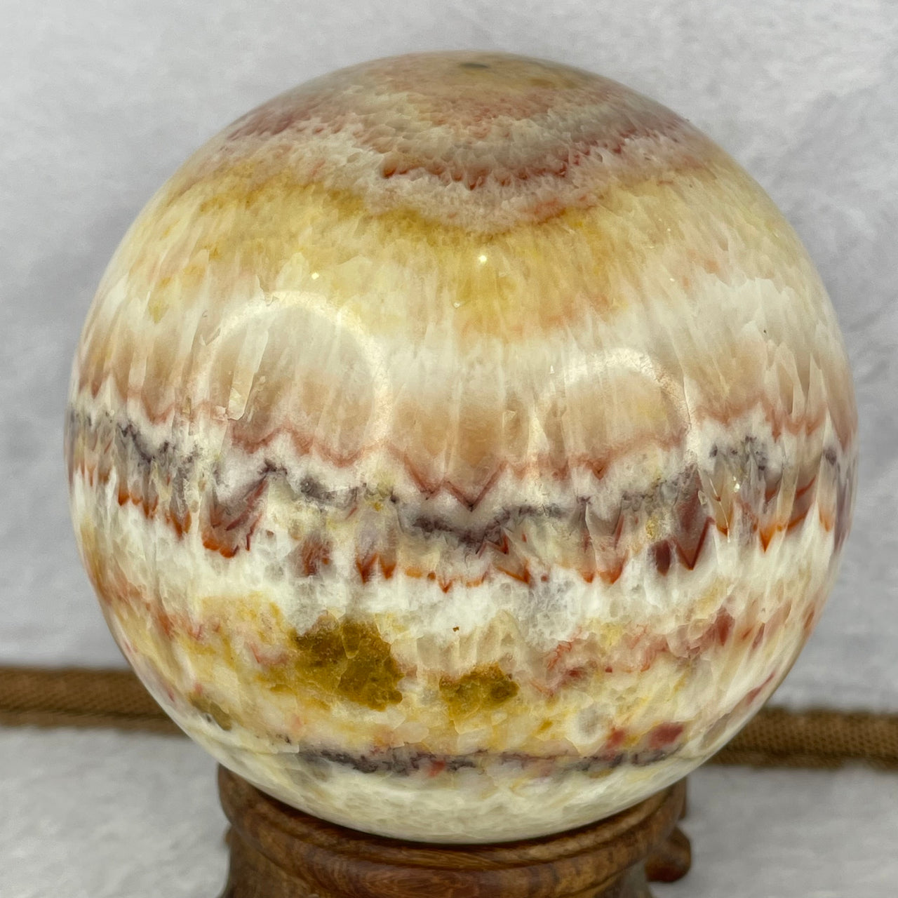 Natural Orange Yellow Red Pink Calcite Sphere Ball with Solid Wooden Stand 1,079.4g 100.0 by Diameter 88.5 mm - Huangs Jadeite and Jewelry Pte Ltd