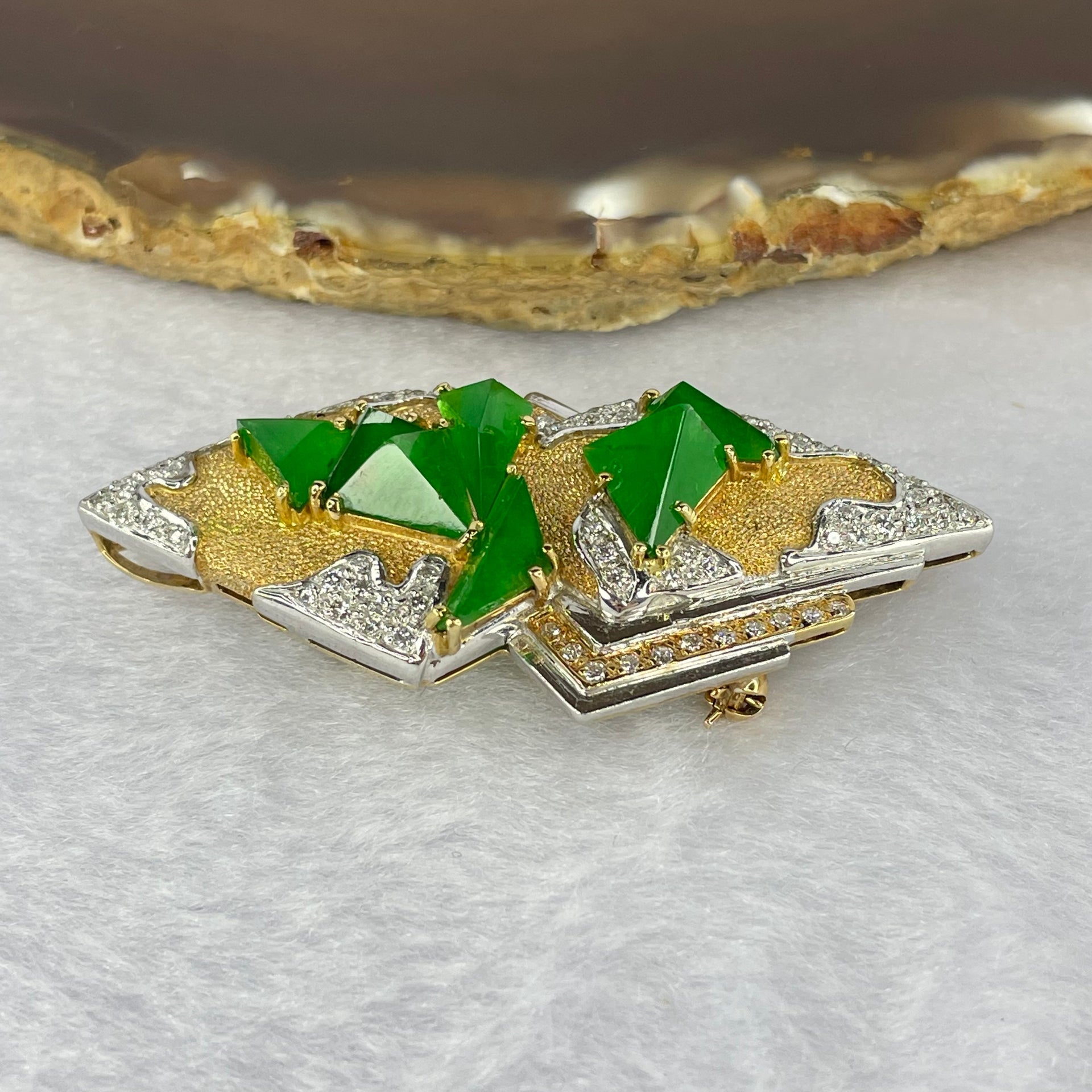 Very Very High Quality Highly Translucent Natural Emerald Green Jadeite (TYPE A) Brooch Approx. 6.5 by 5.50 by 2.82 to 7.97 by 8.30 by 4.63mm Total Weight 17.71g including Natural Diamonds and 18K Yellow Gold and PT900 Setting with NGI Cert No.82835782 - Huangs Jadeite and Jewelry Pte Ltd