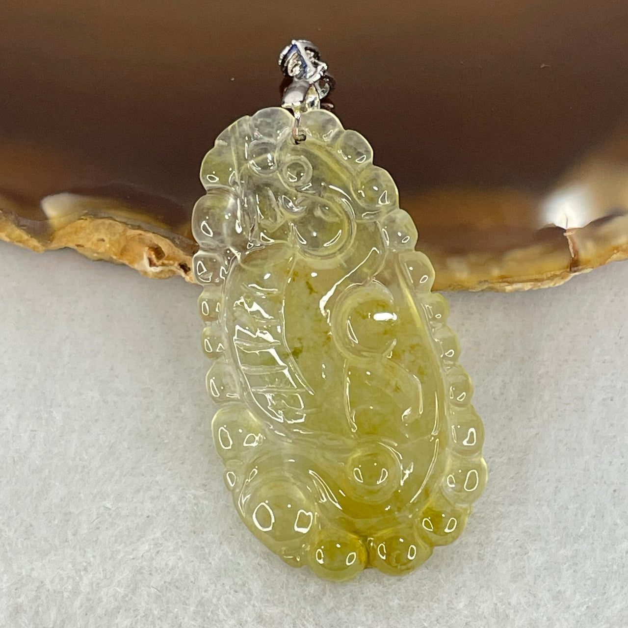 Type A High Icy Yellow to Colourless Jadeite Dragon Pendant 5.26g 39.2 by 21.4 by 3.3mm