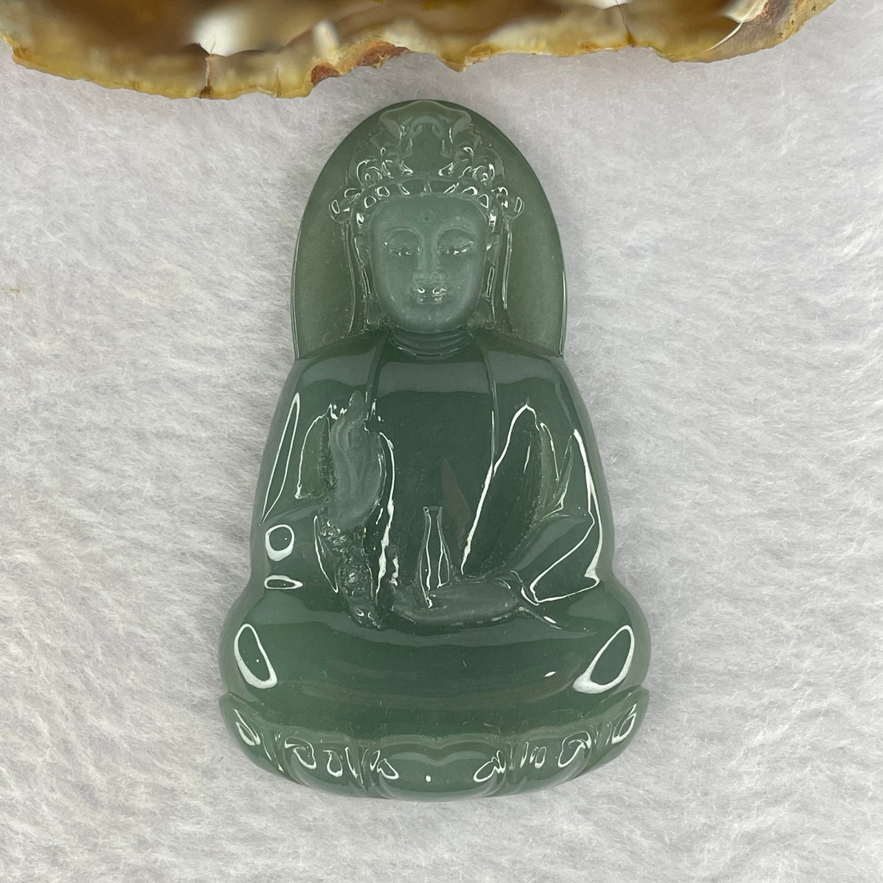 Type A Blueish Green Jadeite Guan Yin 38.95g 62.4 by 38.4 by 9.0mm - Huangs Jadeite and Jewelry Pte Ltd