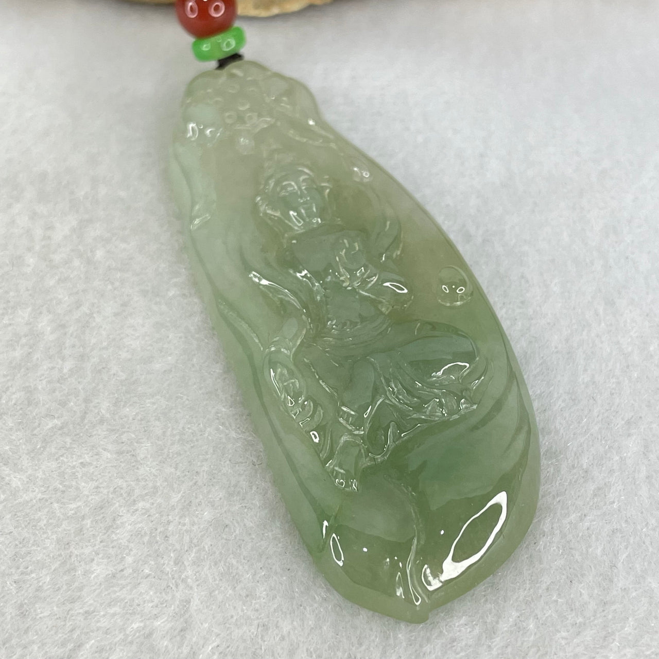 Type A Semi Icy Light Blueish Green Jadeite Guan Yin Pendant 20.29g 62.4 by 25.2 by 6.3mm