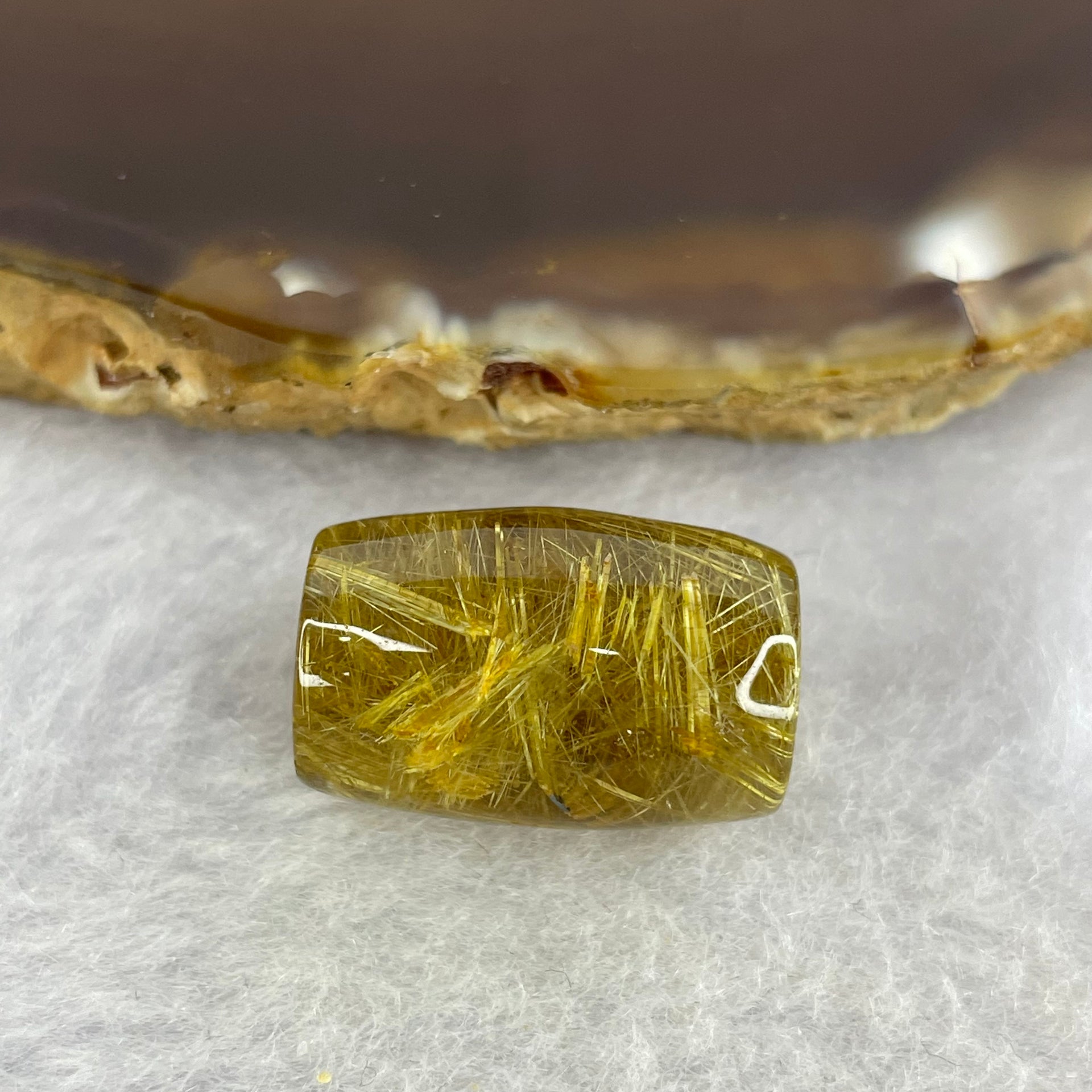 Good Grade Natural Golden Rutilated Quartz Crystal Lulu Tong Barrel 天然金顺发晶水晶露露通桶 
4.90g 18.4 by 12.2mm - Huangs Jadeite and Jewelry Pte Ltd