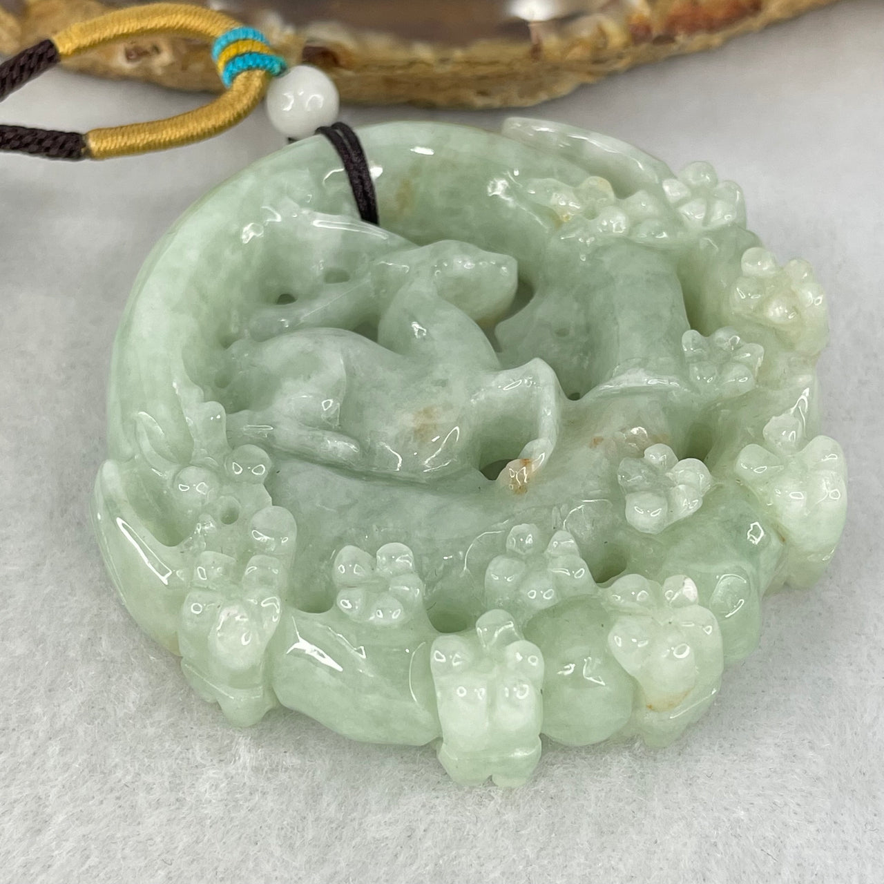 Type A Light Green with Yellow Spots Jadeite Deer And Flowers Pendant 70.94g 55.2 by 56.6 by 13.3mm