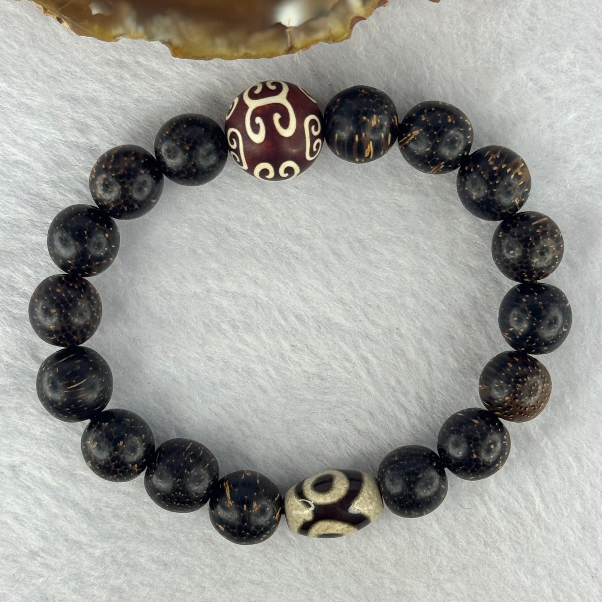 Natural Agarwood With 3 Eyes Dzi Bead Tian Zhu Beads Bracelet 天然沉香带三眼天珠手链 17.56g 16.5cm Dzi 14.4 by 9.8 and 14.1mm 1 Bead and 10.8mm 16 Beads - Huangs Jadeite and Jewelry Pte Ltd