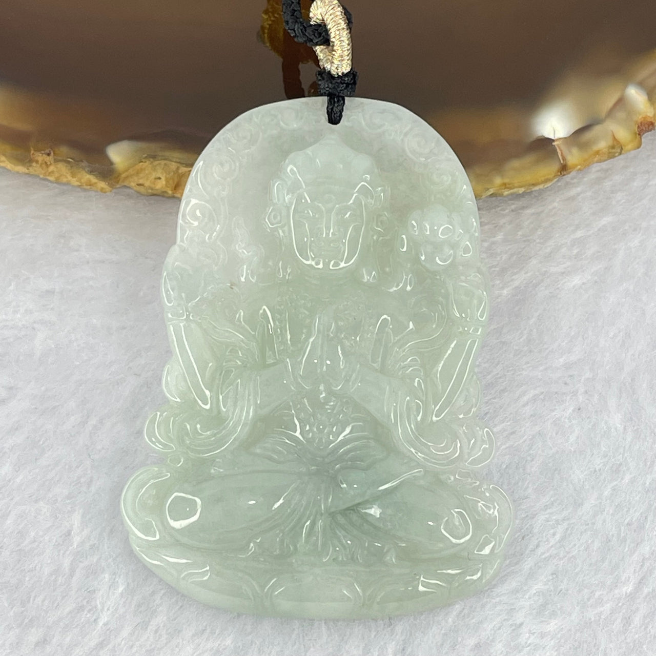 Type A Faint Green Lavender Jadeite Thousand Hand Guan Yin Pendant 18.68g 49.2 by 36.7 by 5.6mm