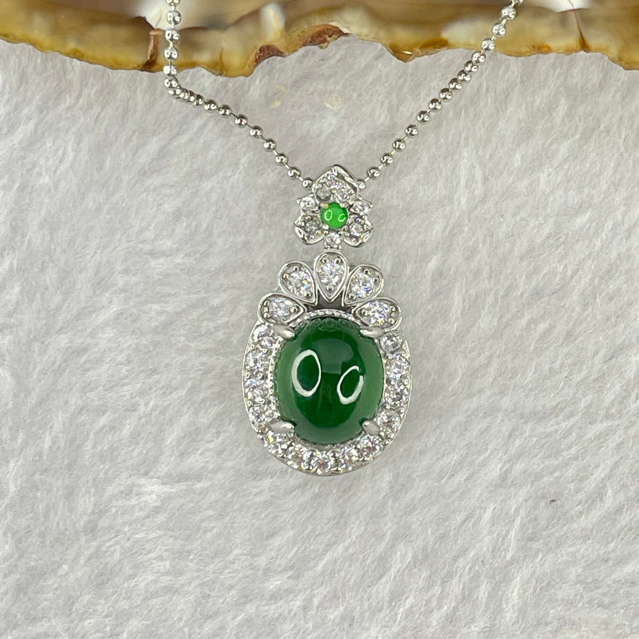 Type A Icy Green Omphasite Jadeite 11.1 by 9.2 by 6.0mm With Crystals in S925 Sliver Necklace 5.28g