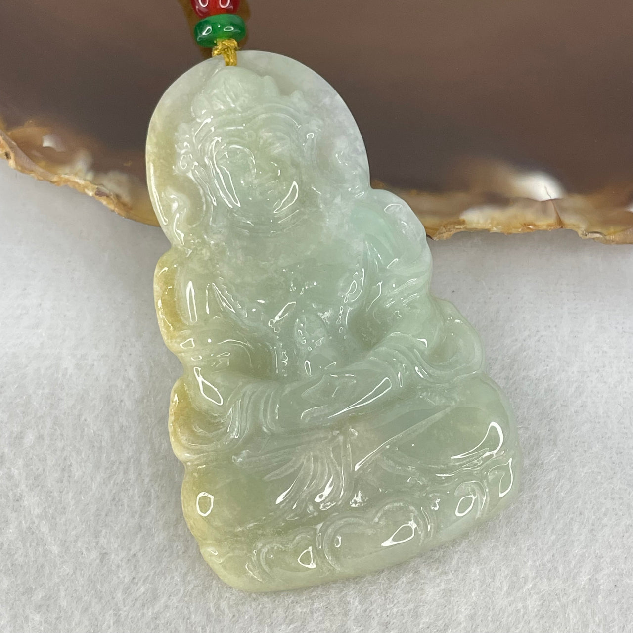 Type A Light Blueish Green with Yellow Jadeite Guan Yin Tara Pendant 29.14g 60.1 by 38.8 by 6.5mm