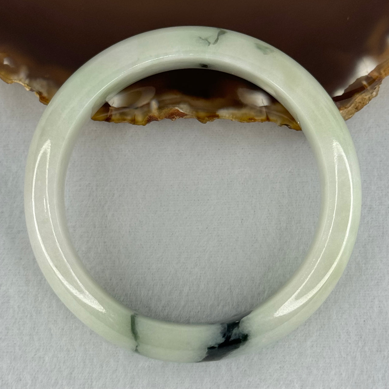 Type A Light Green with Moss Green Patches Jadeite Bangle Internal Diameter 56.5mm 75.29g 16.4 by 8.4mm (Slight Internal Line)