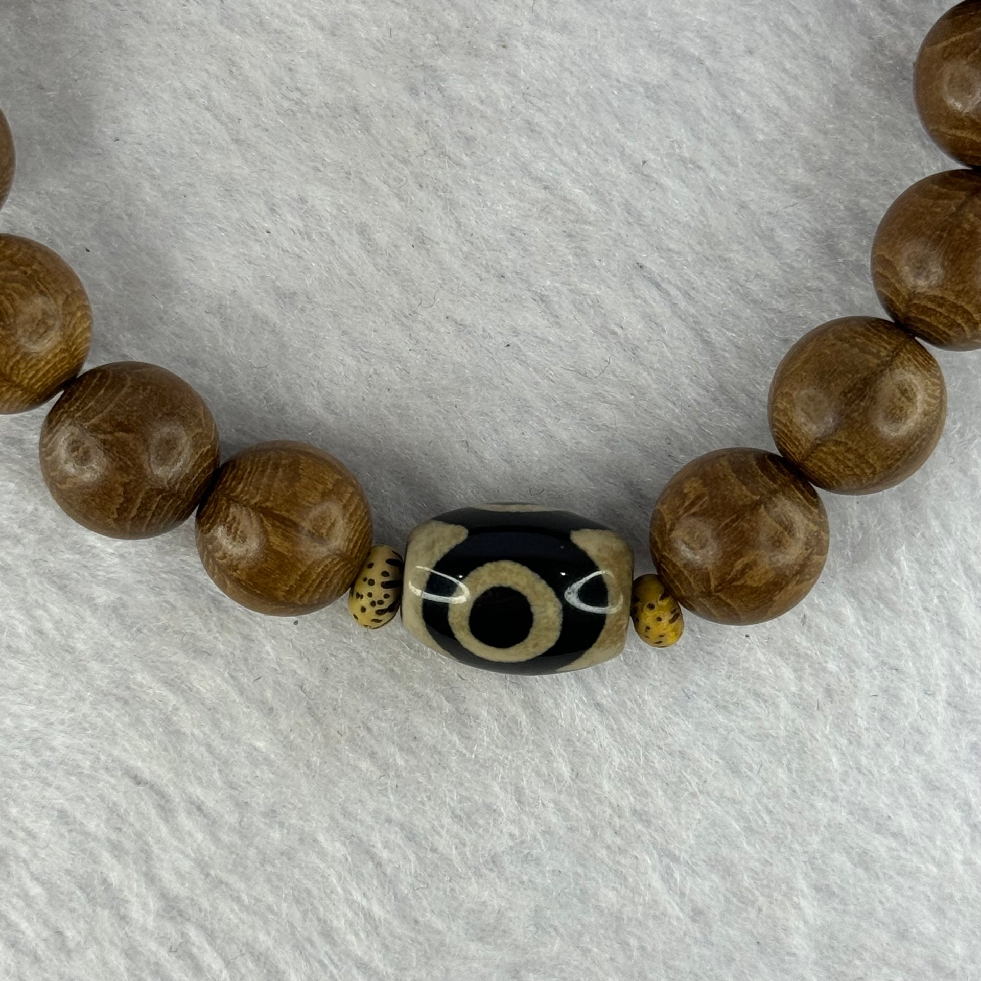 Natural Six Way Wooden Bead With 3 Eyes Dzi Bead Tian Zhu Beads Bracelets 天然六道木带三眼天珠手链 10.56g 16cm 10.3mm 17 Beads/ 13.8 by 10.1mm 1 Bead - Huangs Jadeite and Jewelry Pte Ltd