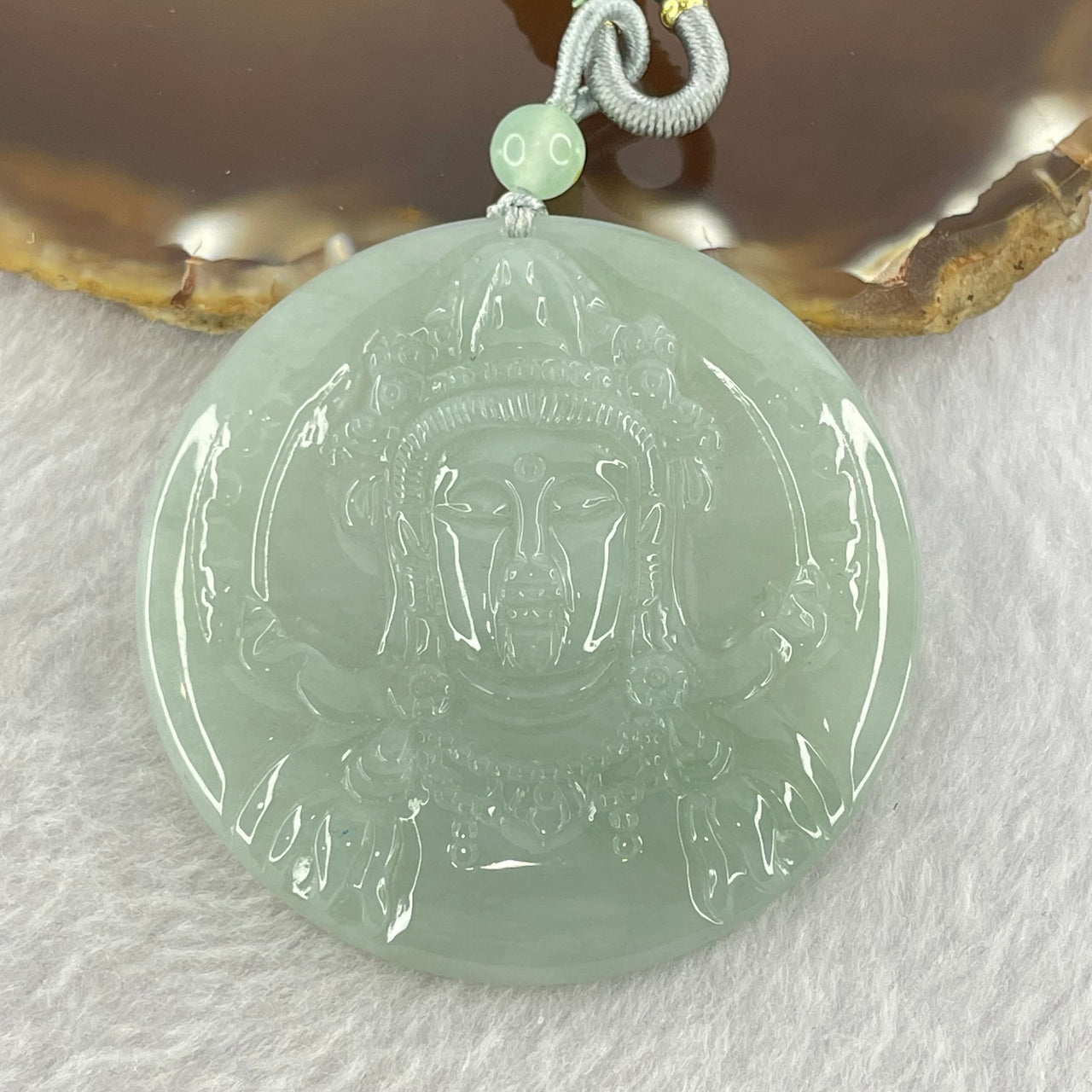 Type A Semi Icy Light Blueish Green Jadeite Guan Yin Pendent 24.52g 50.8 by 5.0mm