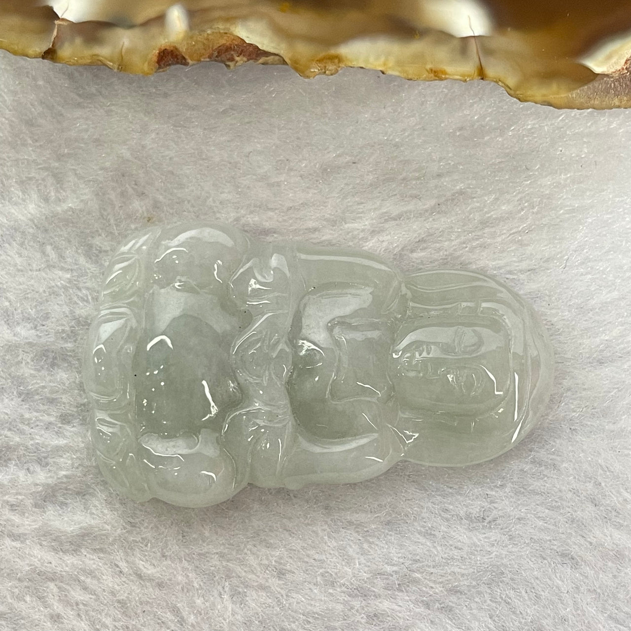 Type A Green Jadeite Guan Yin Pendant 7.84g 41.3 by 25.3 by 4.8mm - Huangs Jadeite and Jewelry Pte Ltd