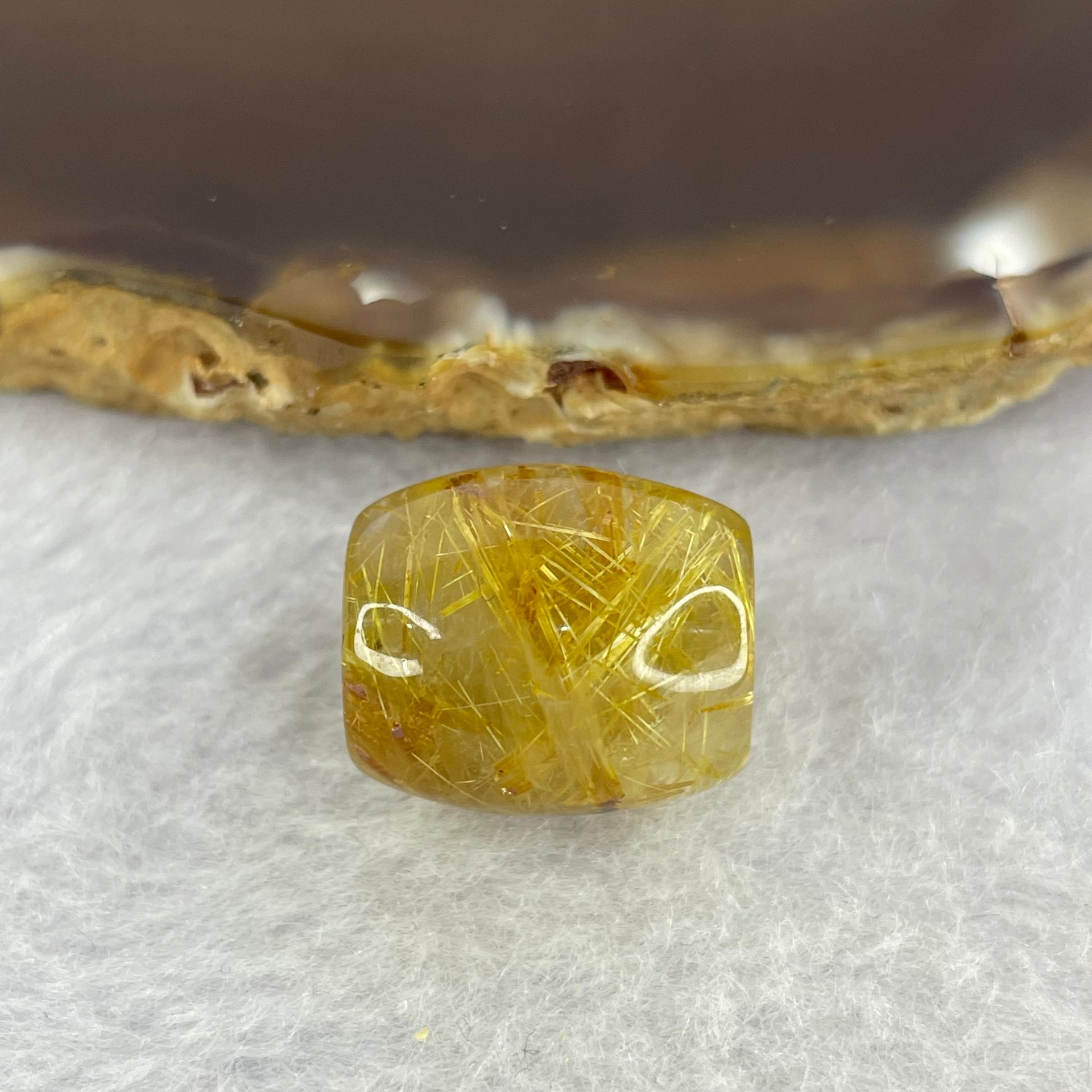 Good Grade Natural Golden Rutilated Quartz Crystal Lulu Tong Barrel 天然金顺发晶水晶露露通桶 
5.59g 16.0 by 13.7mm - Huangs Jadeite and Jewelry Pte Ltd