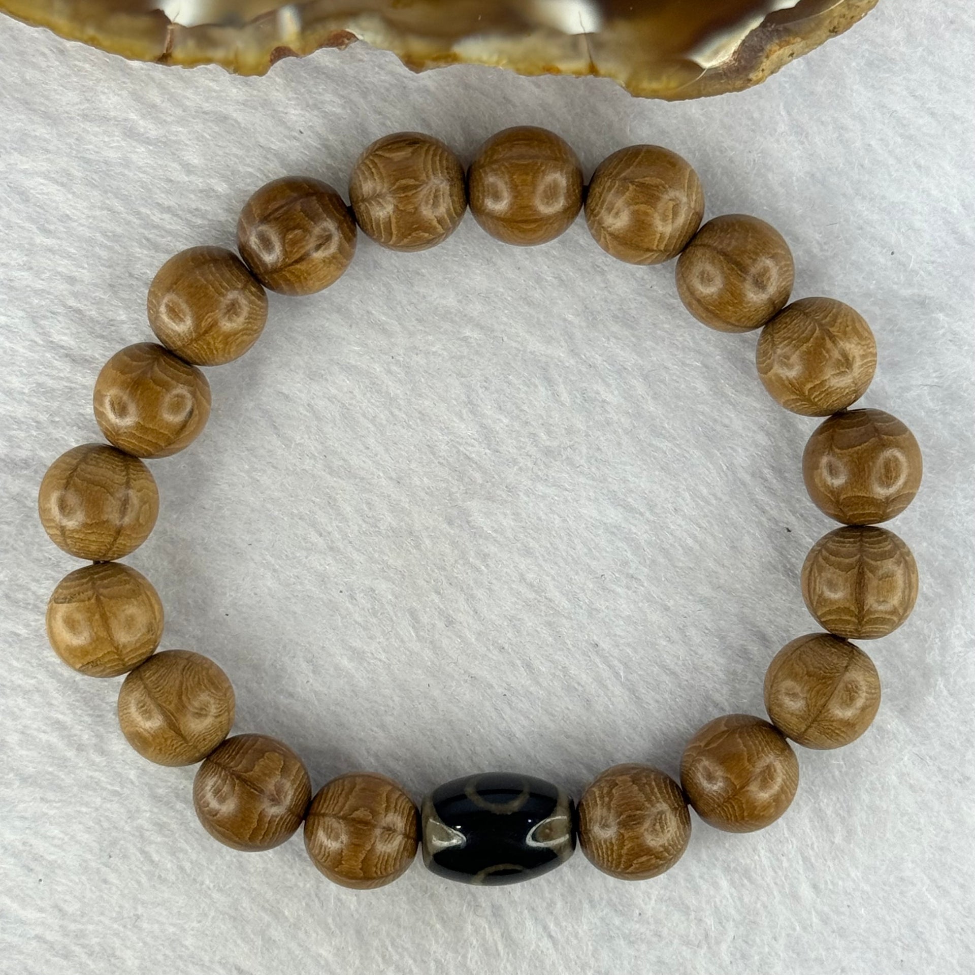 Natural Six Way Wooden Bead With 3 Eyes Dzi Bead Tian Zhu Beads Bracelets 天然六道木带三眼天珠手链 11.42g 16.5cm 10.5mm 18 Beads / 13.6 by 10.2mm 1 Bead - Huangs Jadeite and Jewelry Pte Ltd