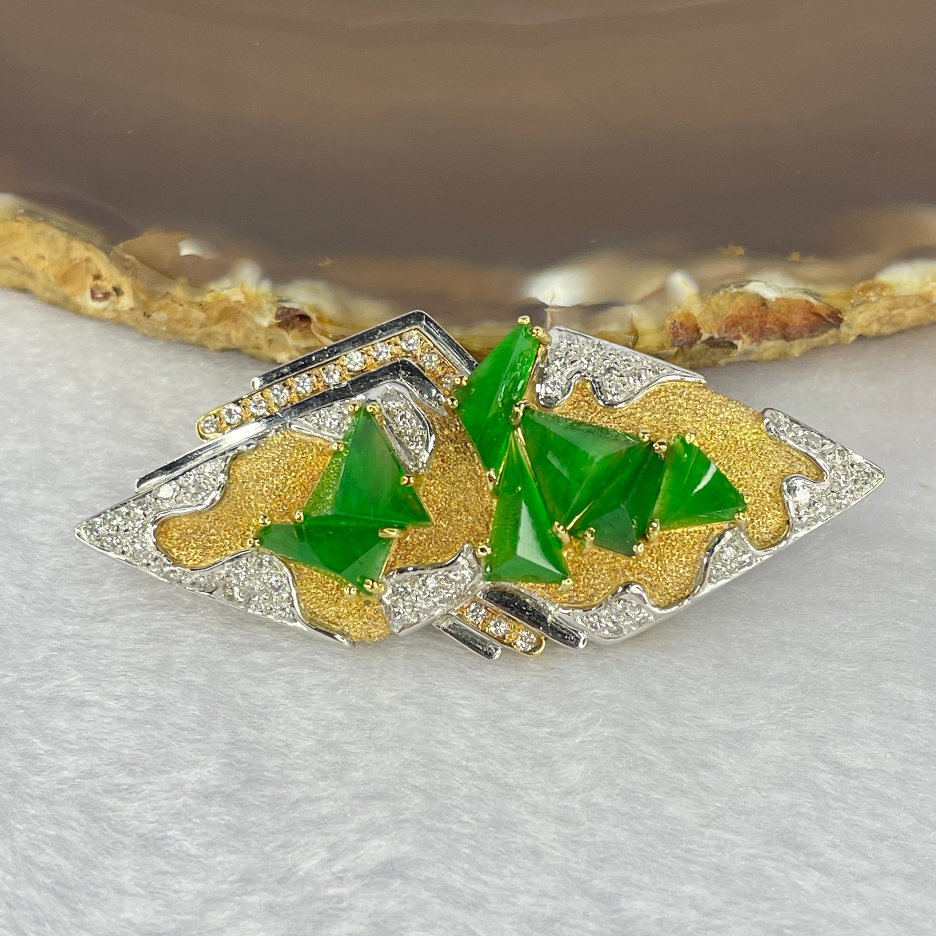 Very Very High Quality Highly Translucent Natural Emerald Green Jadeite (TYPE A) Brooch Approx. 6.5 by 5.50 by 2.82 to 7.97 by 8.30 by 4.63mm Total Weight 17.71g including Natural Diamonds and 18K Yellow Gold and PT900 Setting with NGI Cert No.82835782 - Huangs Jadeite and Jewelry Pte Ltd