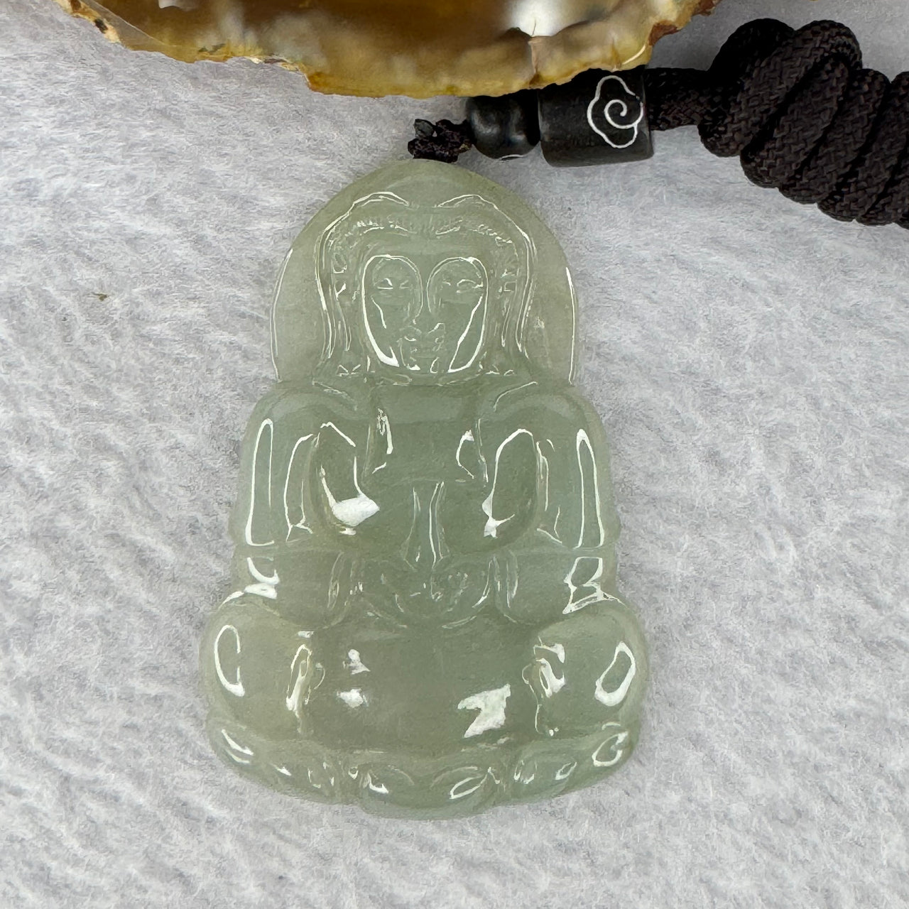 Type A Icy Green Jadeite Guan Yin Pendent 16.22g 49.0 by 33.7 by 4.5mm - Huangs Jadeite and Jewelry Pte Ltd