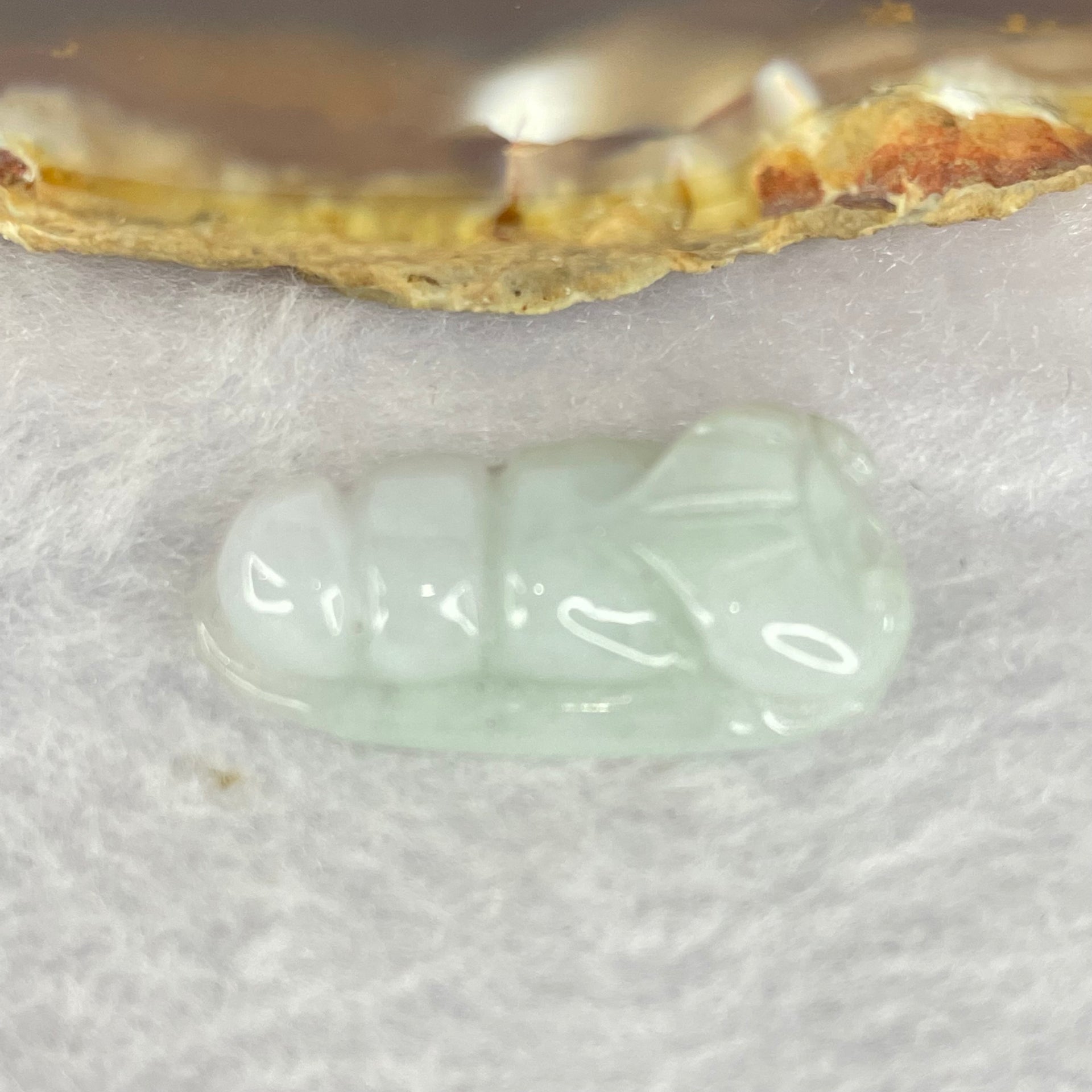 Type A Green Pea Pod Jadeite 3.9g 12.3 by 25.1 by 6.4mm - Huangs Jadeite and Jewelry Pte Ltd