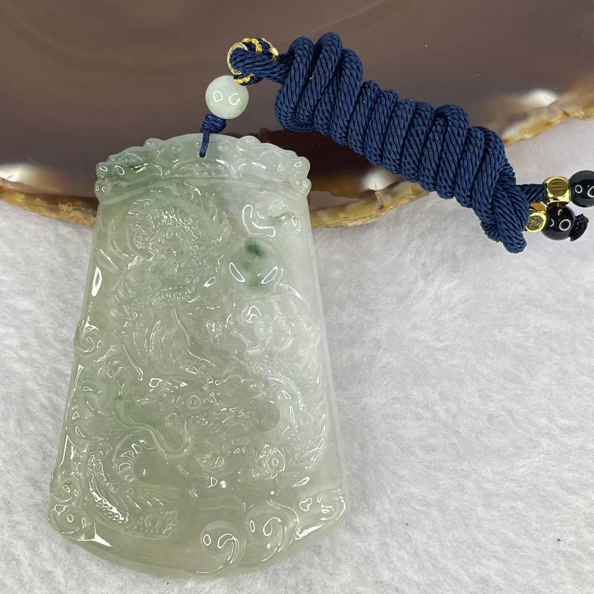 Type A ICY Light Green Jadeite Dragon Pendent 33.14g  68.8 by 44.1 by 6.1mm - Huangs Jadeite and Jewelry Pte Ltd