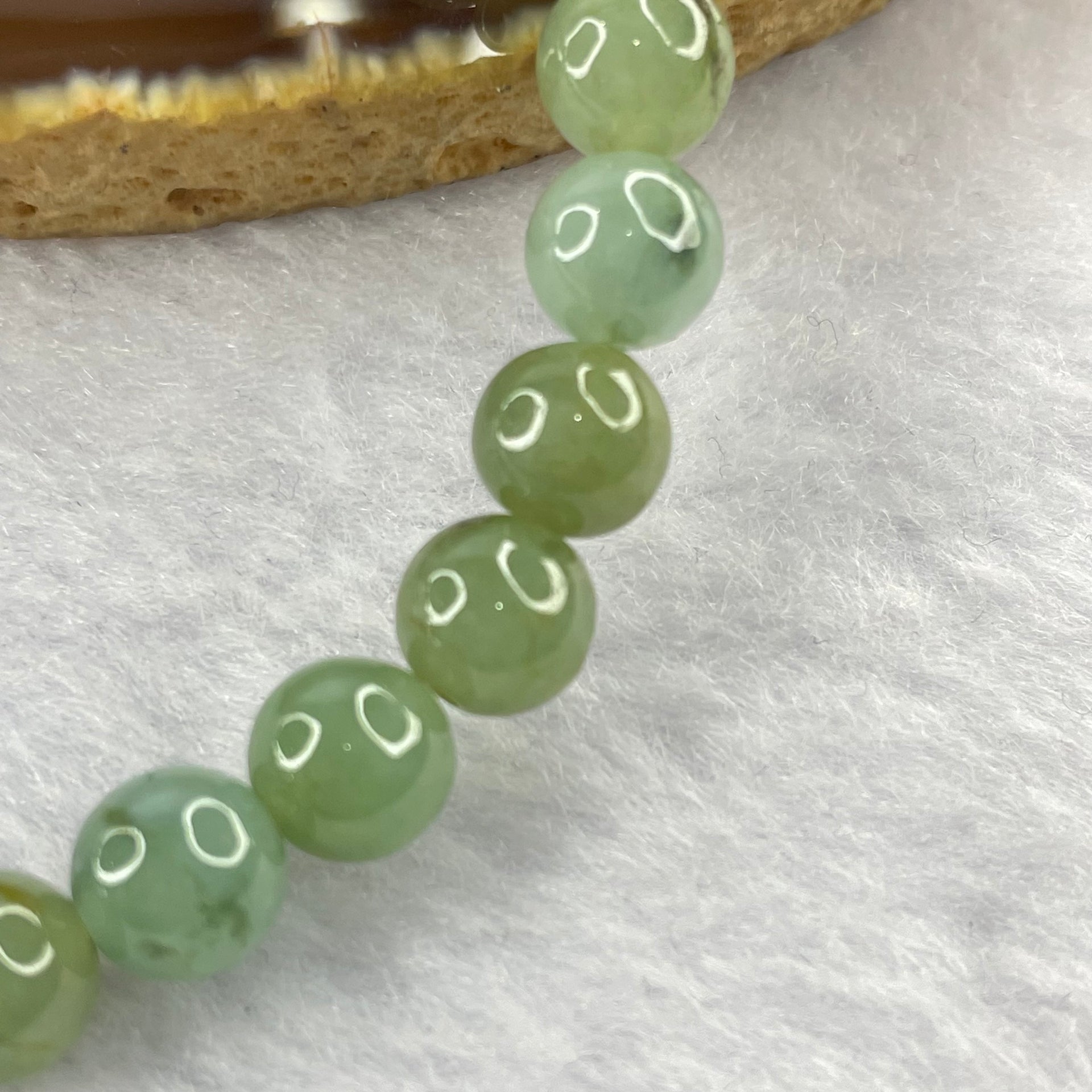 Type A Semi Icy Green Jadeite 25 beads bracelet 7.5mm 17.14g - Huangs Jadeite and Jewelry Pte Ltd