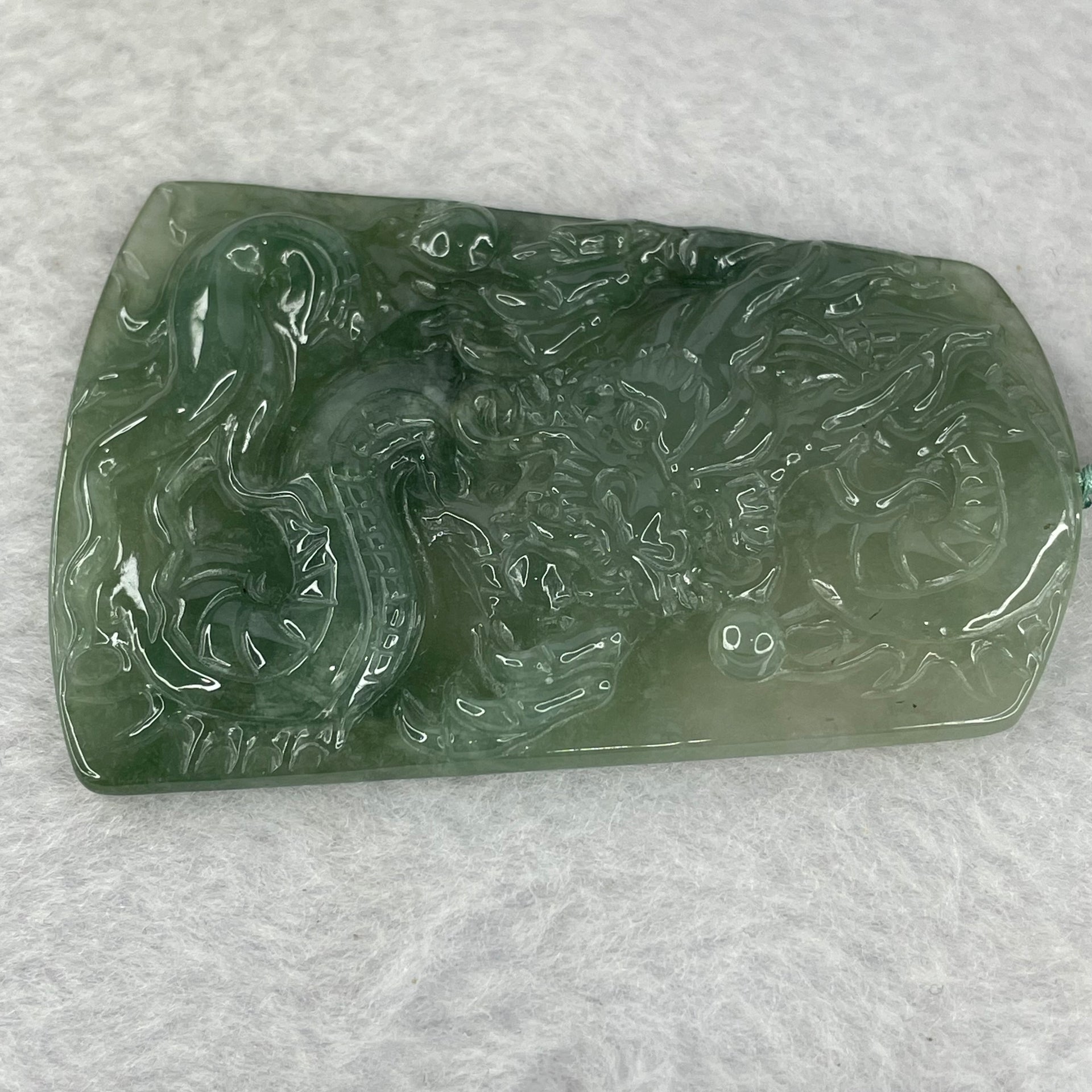 Type A ICY Light Dark Green Jadeite Dragon Pendent 32.71g 65.0 by 44.2 by 5.8mm - Huangs Jadeite and Jewelry Pte Ltd