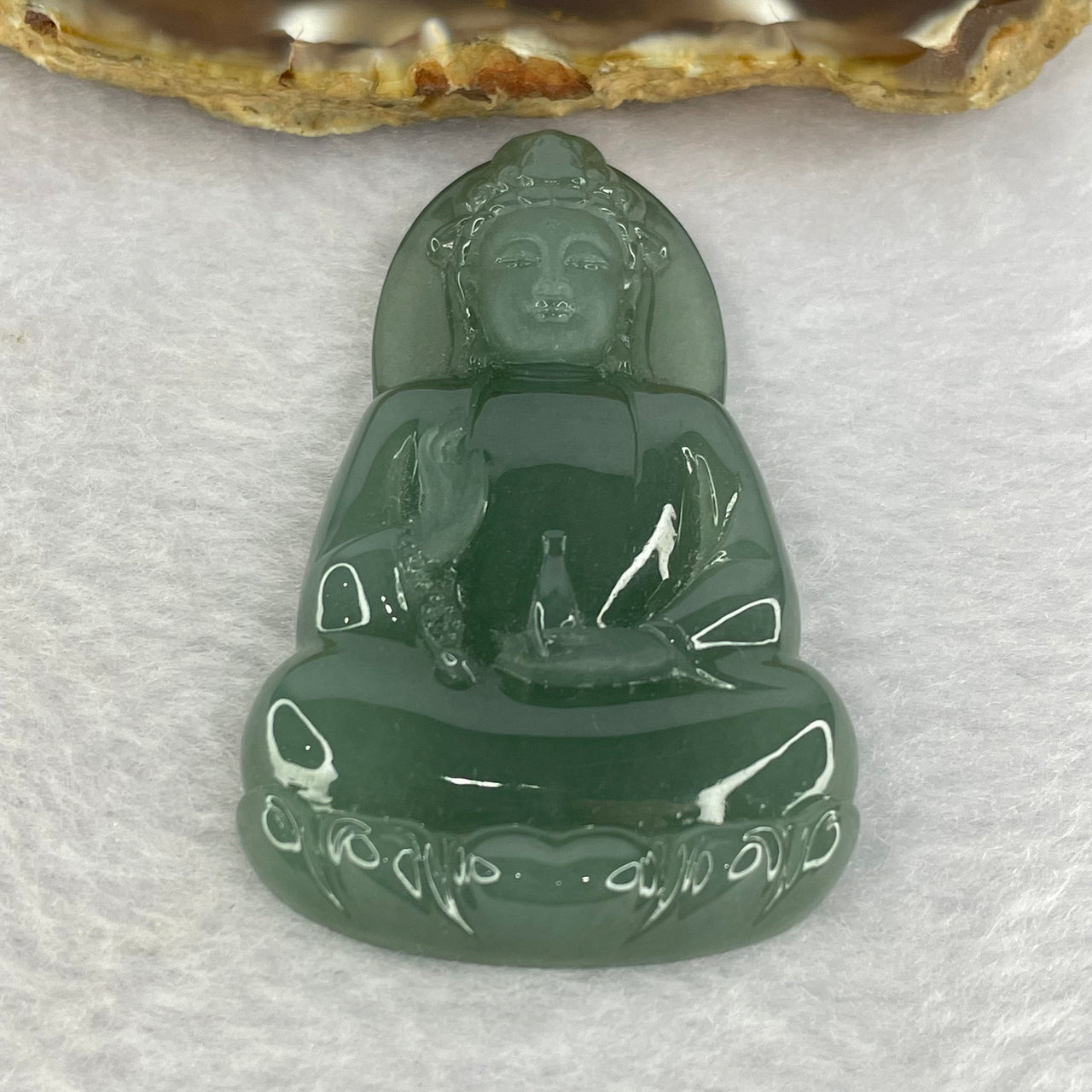 Type A Blueish Green Jadeite Guan Yin 38.95g 62.4 by 38.4 by 9.0mm - Huangs Jadeite and Jewelry Pte Ltd