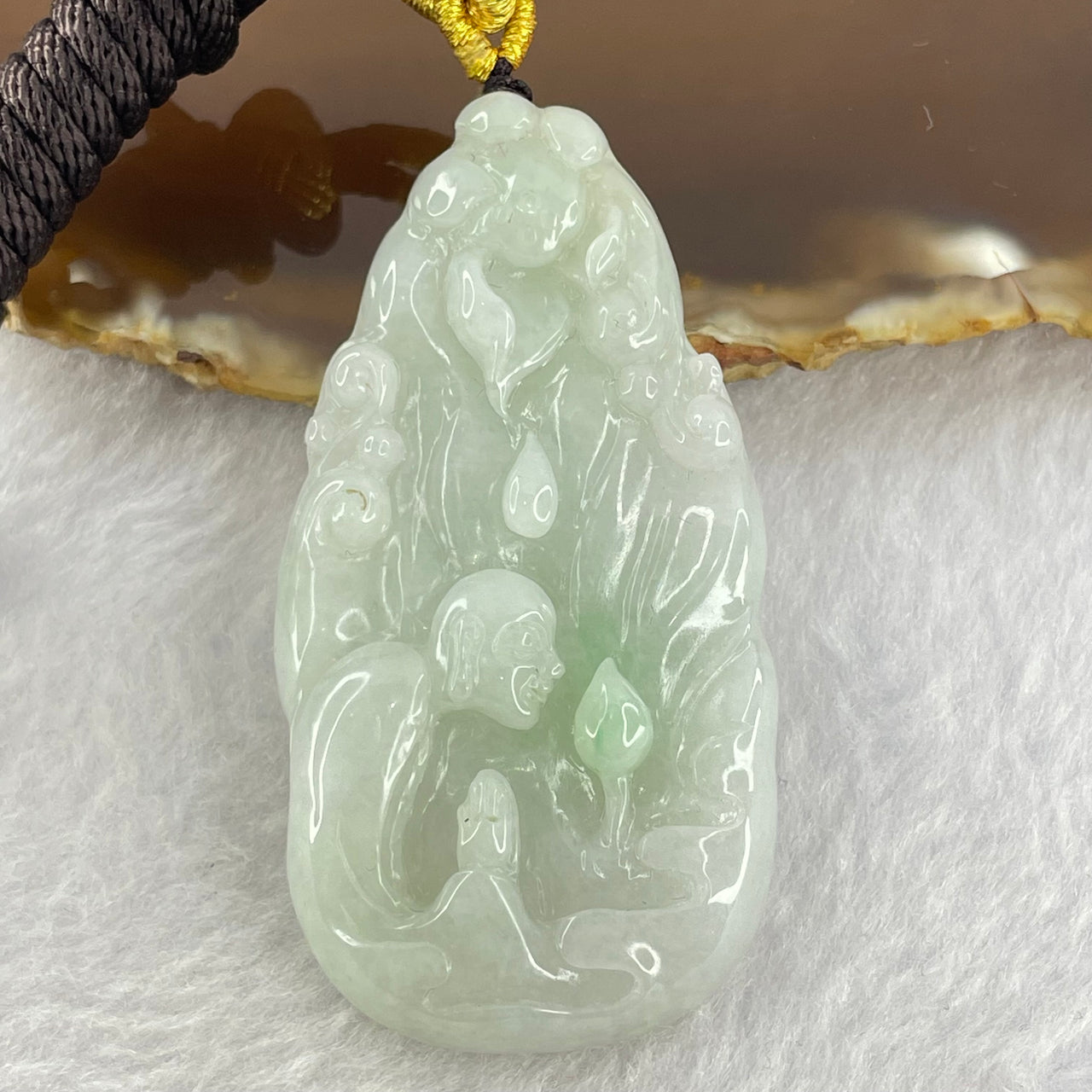 Type A Light Green Jadeite Seeking Enlightenment Pendent 28.45g 58.5 by 30.5 by 10.2mm