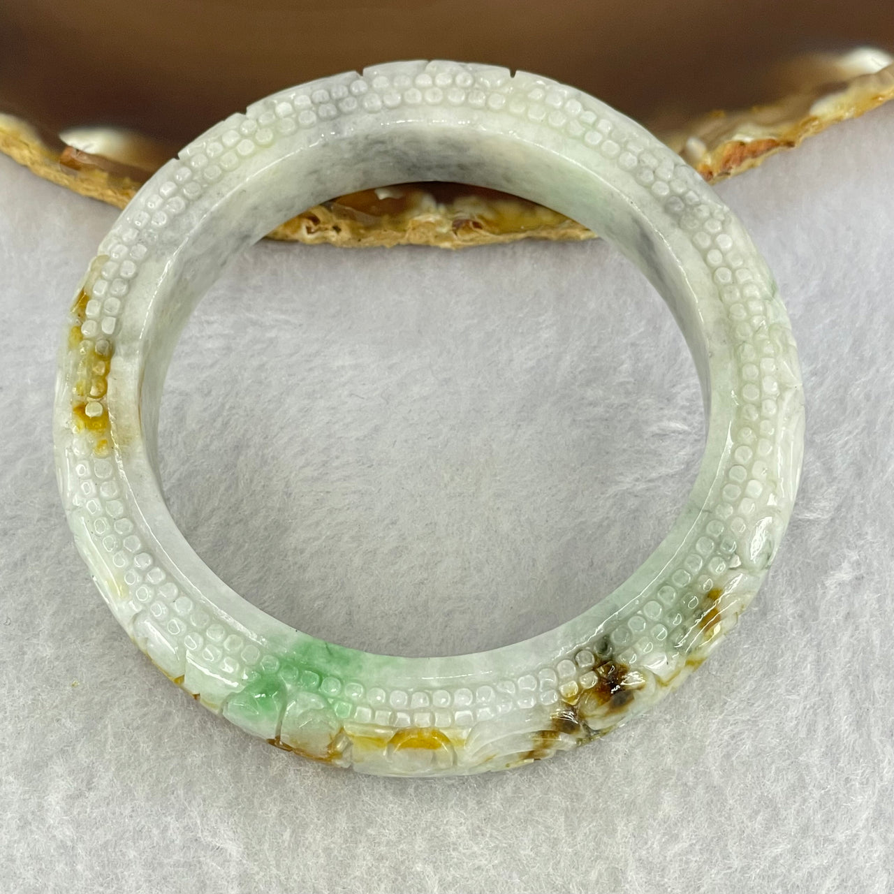 Type A Green Lavender with Brown Yellow Patches Jadeite Carved Ruyi Bangle Internal Diameter 56.3mm 76.21g 13.8 by 10.5mm (Internal Lines)