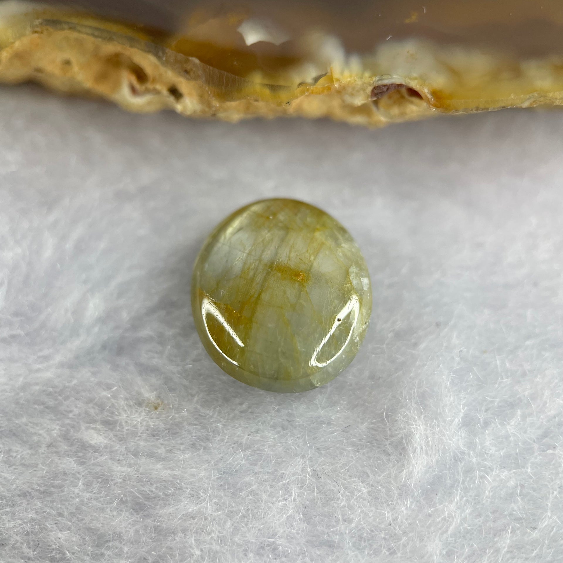 Natural Yellow Blue Star Sapphire 10.80 ct 13.6 by 11.8 by 5.7mm - Huangs Jadeite and Jewelry Pte Ltd