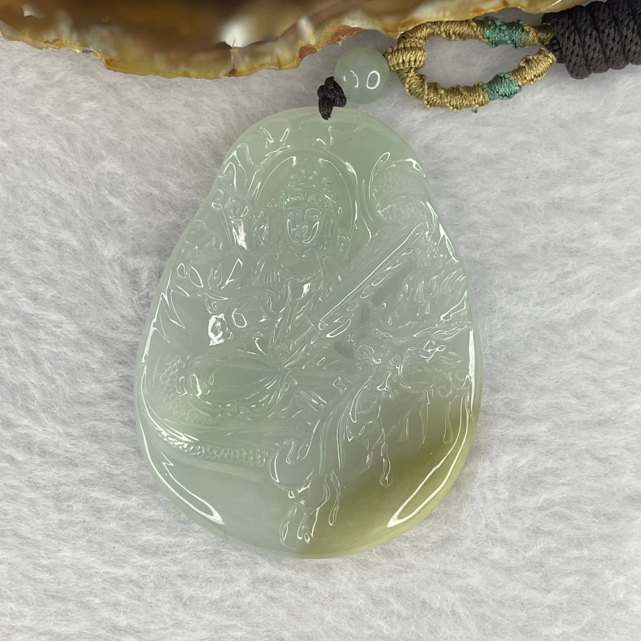 Grand Master Type A Sky Blue with Yellow Jadeite Guan Yin with Dragon 玉龙观音 Pendant 31.86g 59.37 by 45.9 by 5.6mm - Huangs Jadeite and Jewelry Pte Ltd