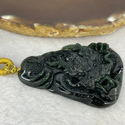 Rare High End Type A Fully Translucent Black Omphasite Jadeite Dragon (Shine Light is Dark Blueish Green) 罕见高端 A 货半透明黑色绿辉石翡翠龙  31.72g (Including String and 18K Hold Clasp) 53.75 by 40.40 by 9.65g with NGI Cert No. 82823872 - Huangs Jadeite and Jewelry Pte Ltd