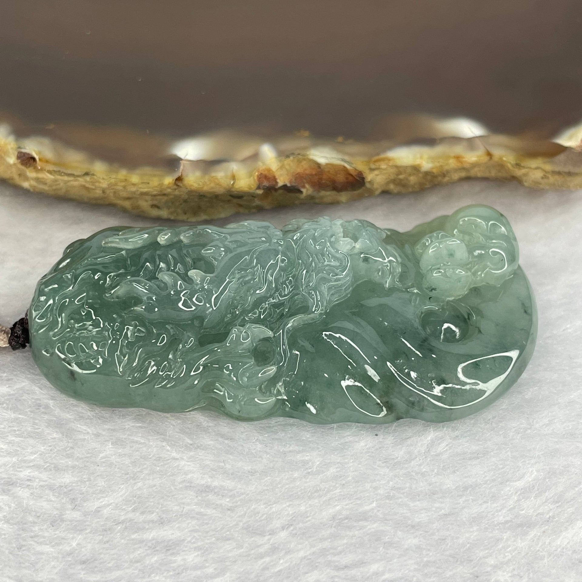 Type A Semi Icy Dragon Pendant 32.45g 56.6 by 28.0 by 12.4mm - Huangs Jadeite and Jewelry Pte Ltd