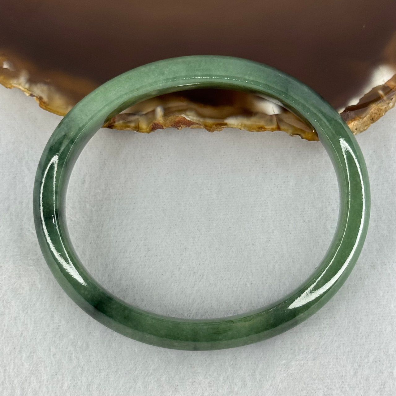 Type A Green Jadeite Oval Bangle Internal Diameter 57.7mm 36.44g 11.6 by 7.0mm (Slight Internal Lines)