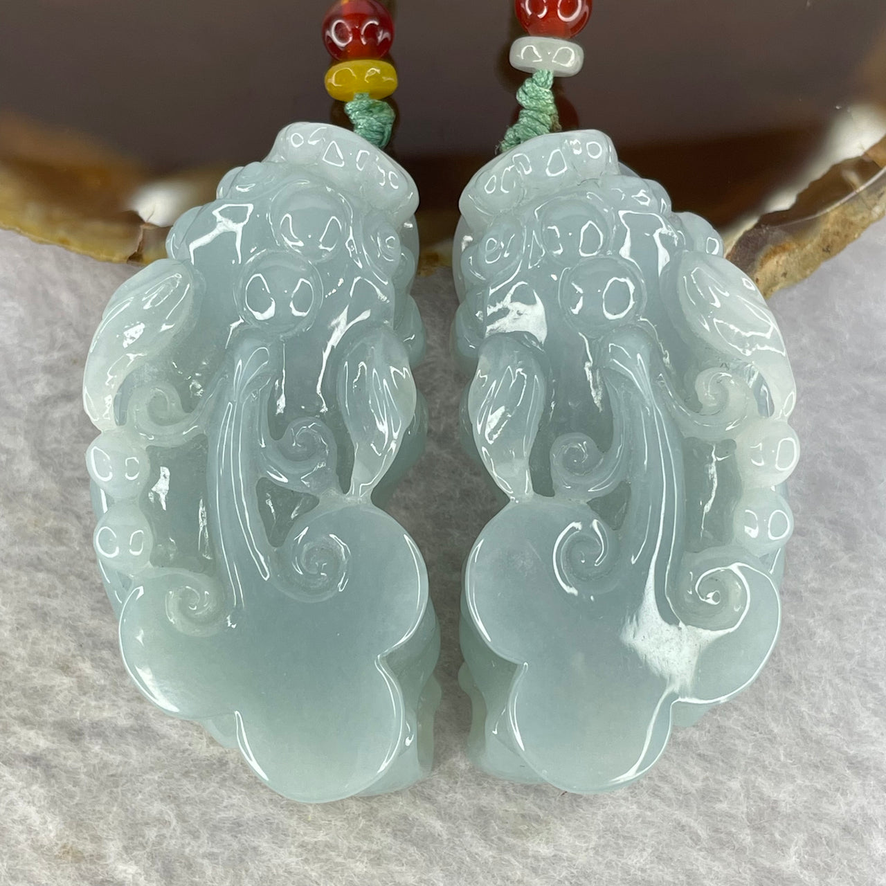 Type A Sky Blue Jadeite Pixiu Pair  40.26g 50.7 by 26.4 by 14.3 mm and 38.99g 49.7 by 25.3 by 14.2 mm - Huangs Jadeite and Jewelry Pte Ltd