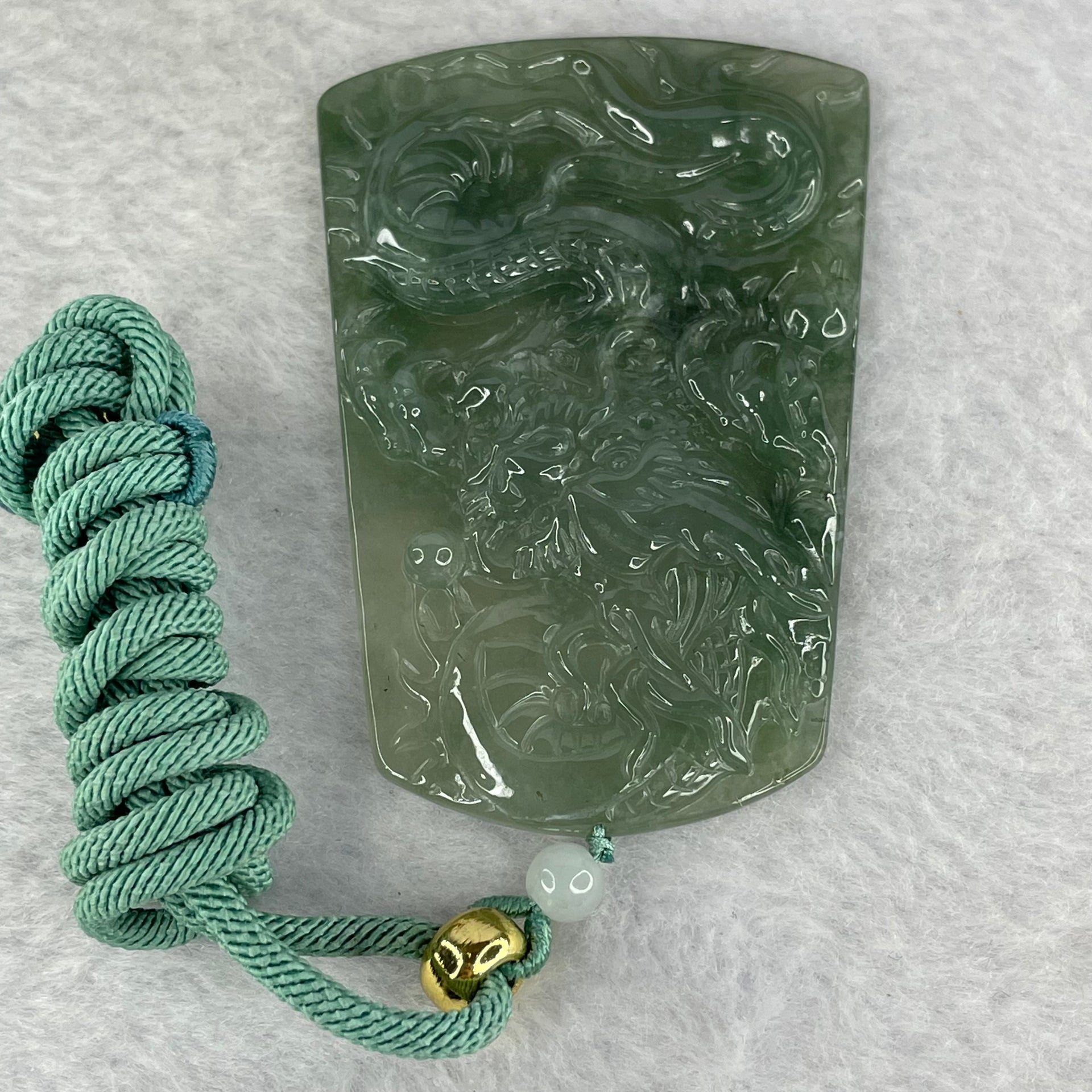 Type A ICY Light Dark Green Jadeite Dragon Pendent 32.71g 65.0 by 44.2 by 5.8mm - Huangs Jadeite and Jewelry Pte Ltd