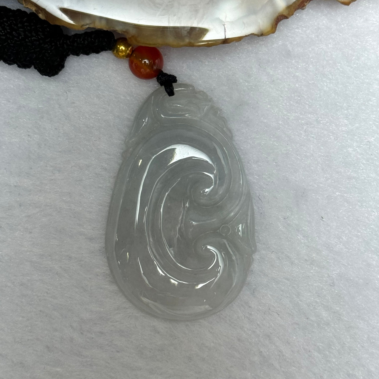 Type A Light Lavender Jadeite Ruyi Pendent 16.17g 42.2 by 26.8 by 6.8mm - Huangs Jadeite and Jewelry Pte Ltd