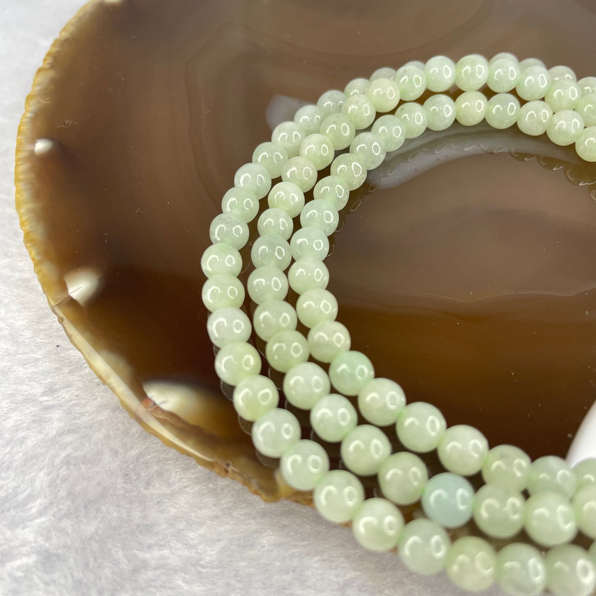 Type A Semi Icy Green with Wuji Grey Piao Hua Beads Necklace 125 Beads 5.5mm 32.88g - Huangs Jadeite and Jewelry Pte Ltd