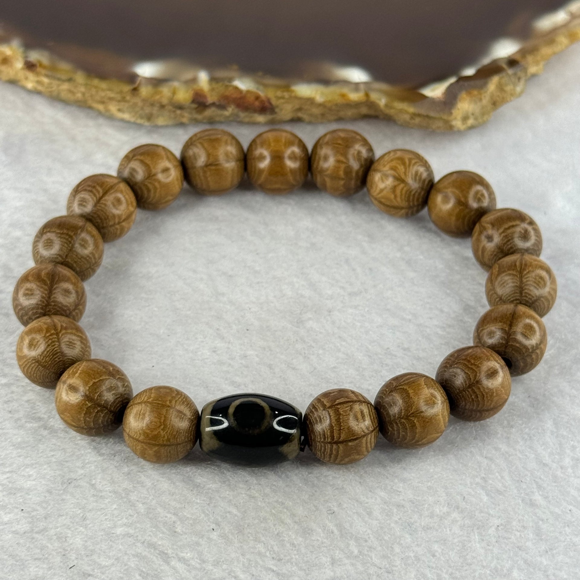 Natural Six Way Wooden Bead With 3 Eyes Dzi Bead Tian Zhu Beads Bracelets 天然六道木带三眼天珠手链 11.37g 16.5cm 10.4mm 18 Beads/ 13.5 by 10.1mm 1 Bead - Huangs Jadeite and Jewelry Pte Ltd