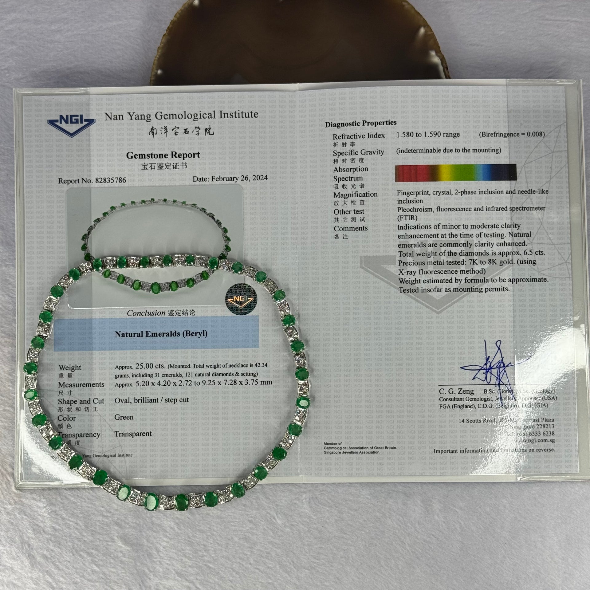 Natural Emeralds (Beryl) 25.0 cts. Total 42.34g including 31 Emeralds, 121 Natural Diamonds in 8k White Gold with NGI Cert No. 82835786 - Huangs Jadeite and Jewelry Pte Ltd