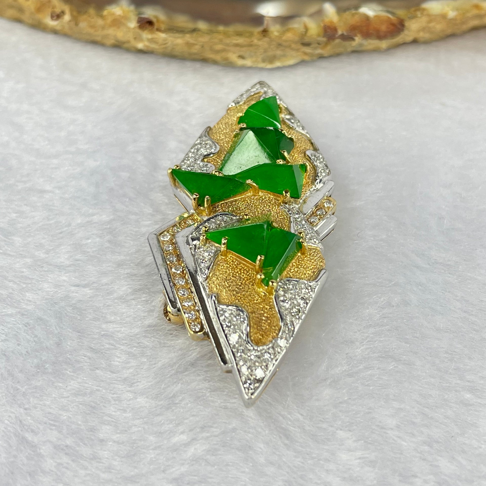 Very Very High Quality Highly Translucent Natural Emerald Green Jadeite (TYPE A) Brooch Approx. 6.5 by 5.50 by 2.82 to 7.97 by 8.30 by 4.63mm Total Weight 17.71g including Natural Diamonds and 18K Yellow Gold and PT900 Setting with NGI Cert No.82835782 - Huangs Jadeite and Jewelry Pte Ltd