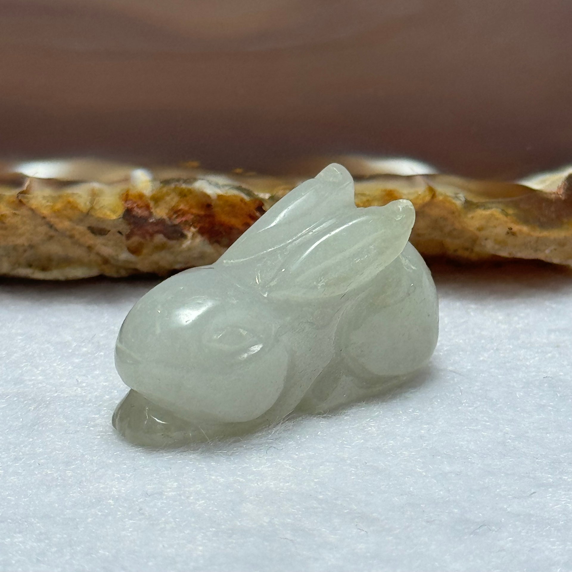 Type A Light Lavender Green Jadeite Rabbit Pendant 13.12g 31.6 by 12.8 by 17.8mm - Huangs Jadeite and Jewelry Pte Ltd