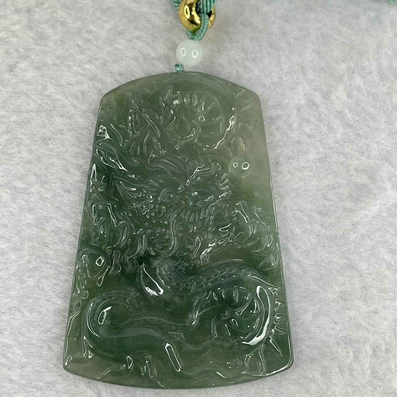 Type A ICY Light Dark Green Jadeite Dragon Pendent 32.71g 65.0 by 44.2 by 5.8mm - Huangs Jadeite and Jewelry Pte Ltd