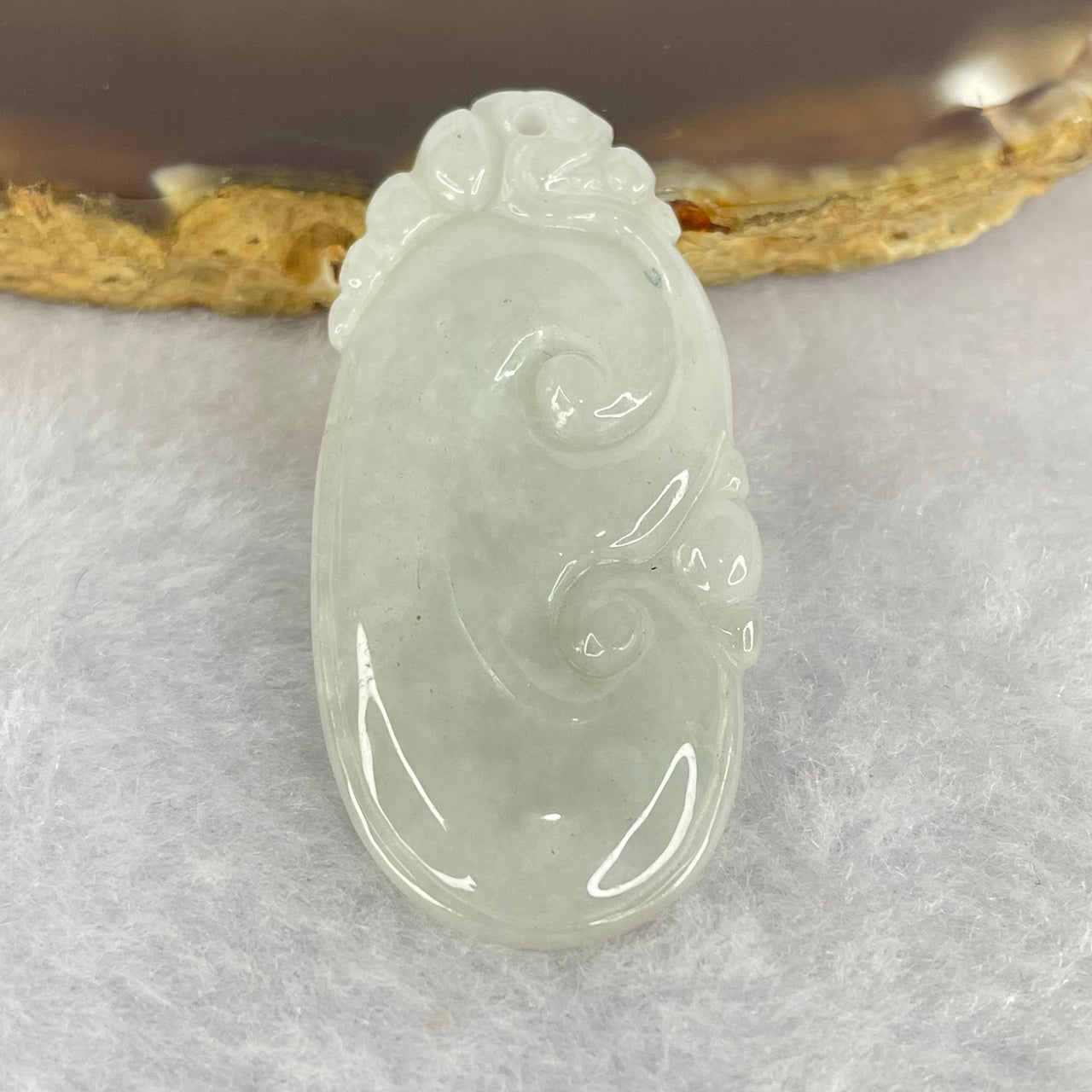 Type A Faint Green Jadeite Ruyi 如意 32.50g 43.7 by 21.3mm by 3.8mm - Huangs Jadeite and Jewelry Pte Ltd