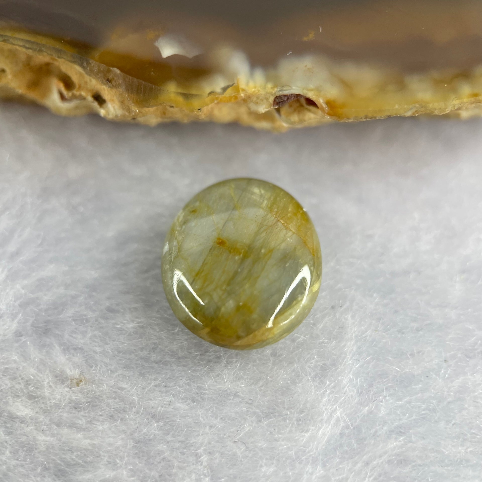 Natural Yellow Blue Star Sapphire 10.80 ct 13.6 by 11.8 by 5.7mm - Huangs Jadeite and Jewelry Pte Ltd