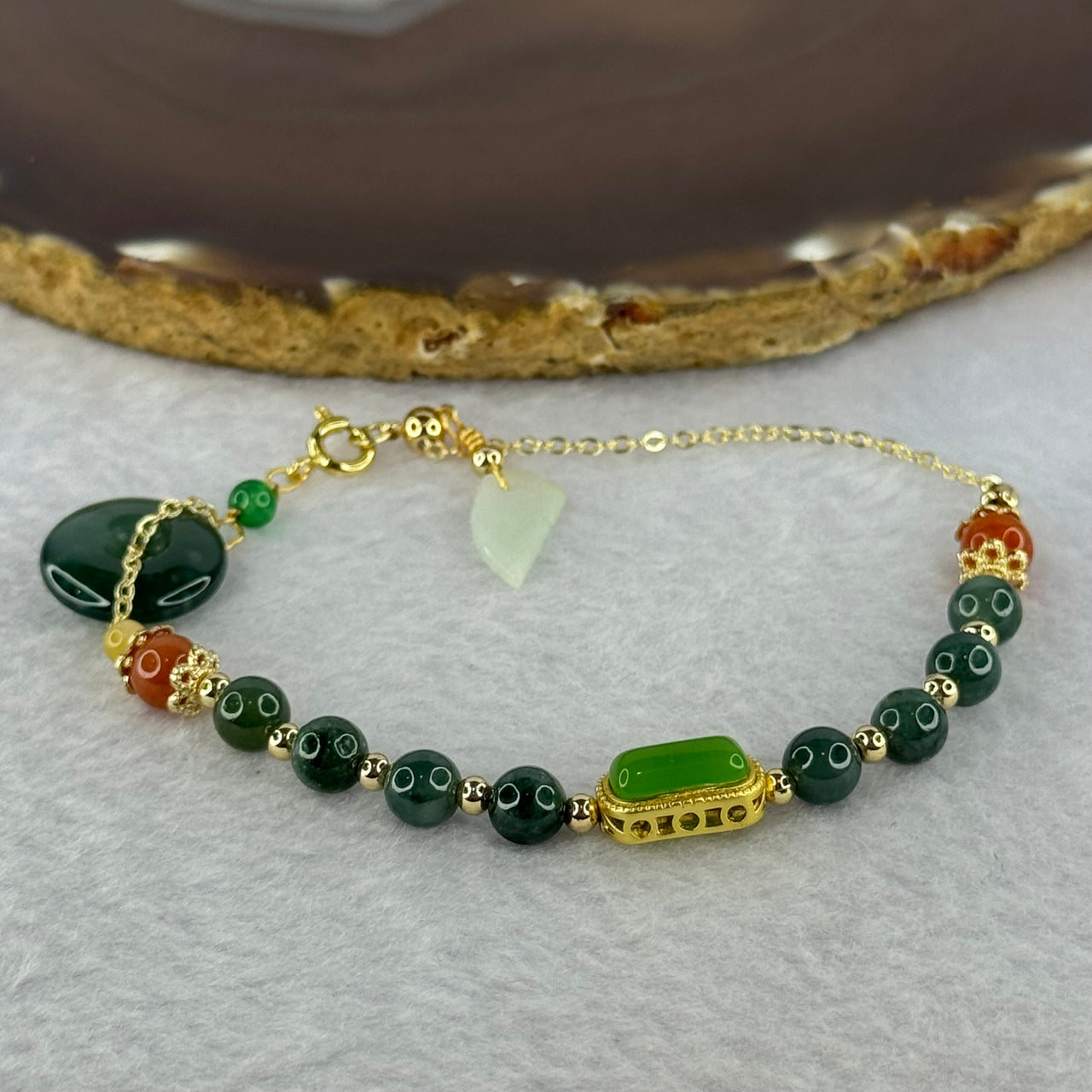 Type A Icy Blueish Green Jadeite Ping An Kou Donut 15.4 by 4.4mm and 6.0mm 8 Beads in Gold Color Bracelet